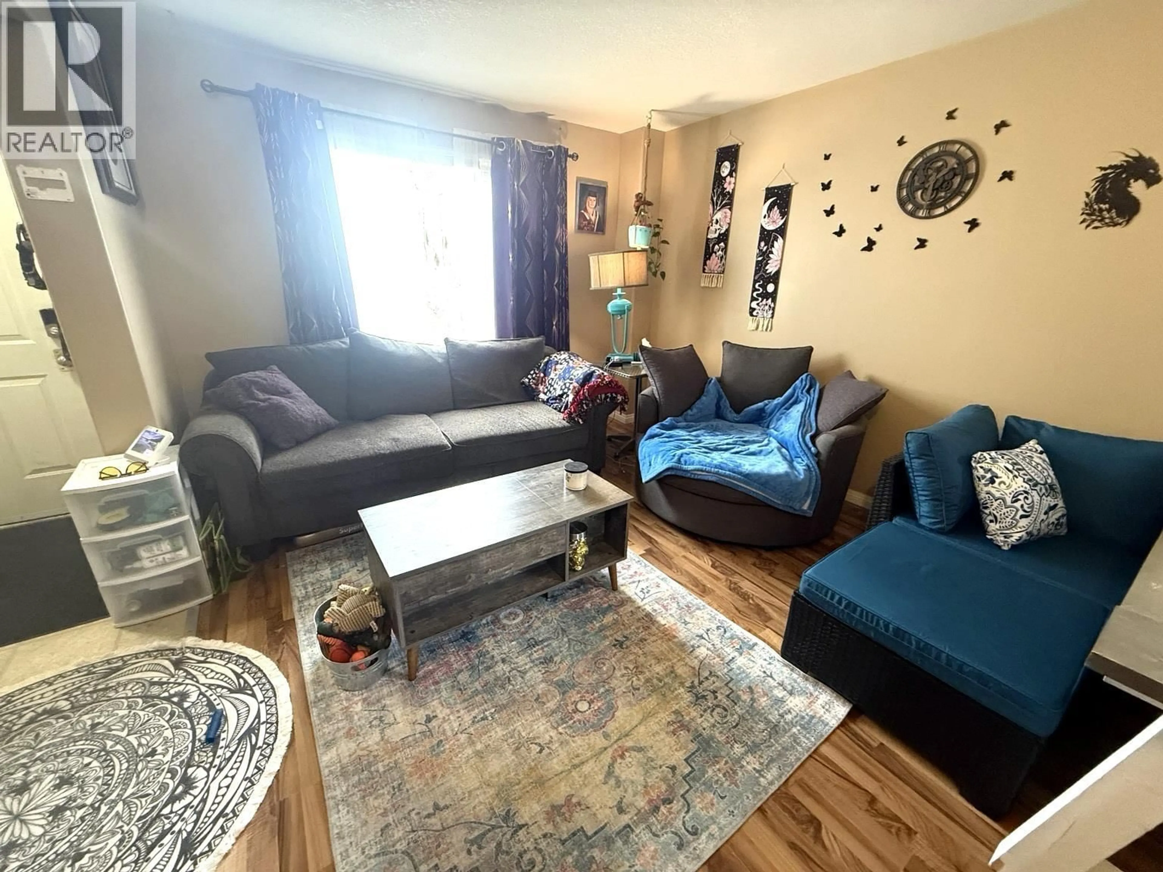 Living room with furniture, unknown for 11119 101 AVENUE, Fort St. John British Columbia V1J2C4