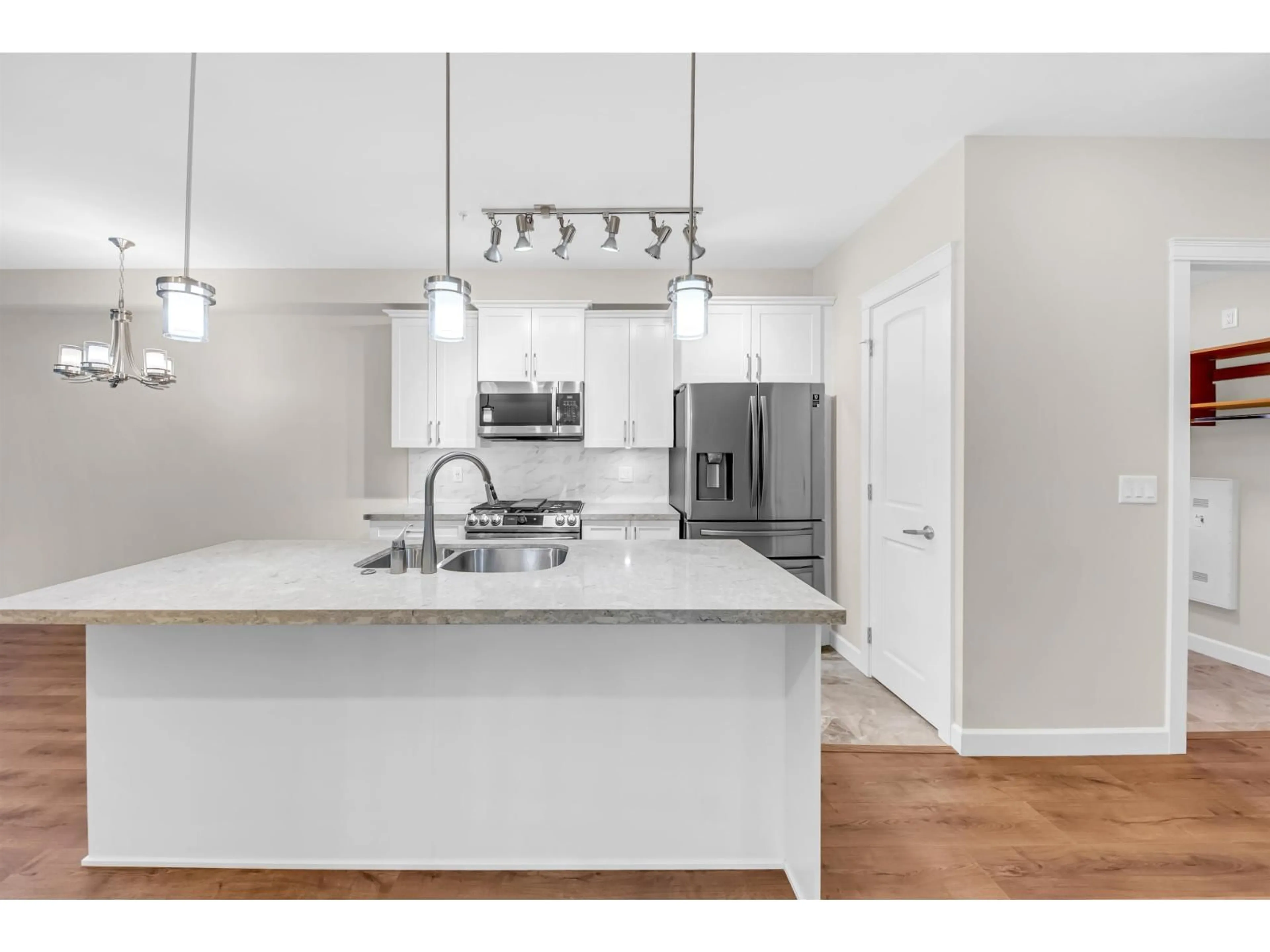 Open concept kitchen, unknown for 201 - 20328 86 AVENUE, Langley British Columbia V2Y3L5