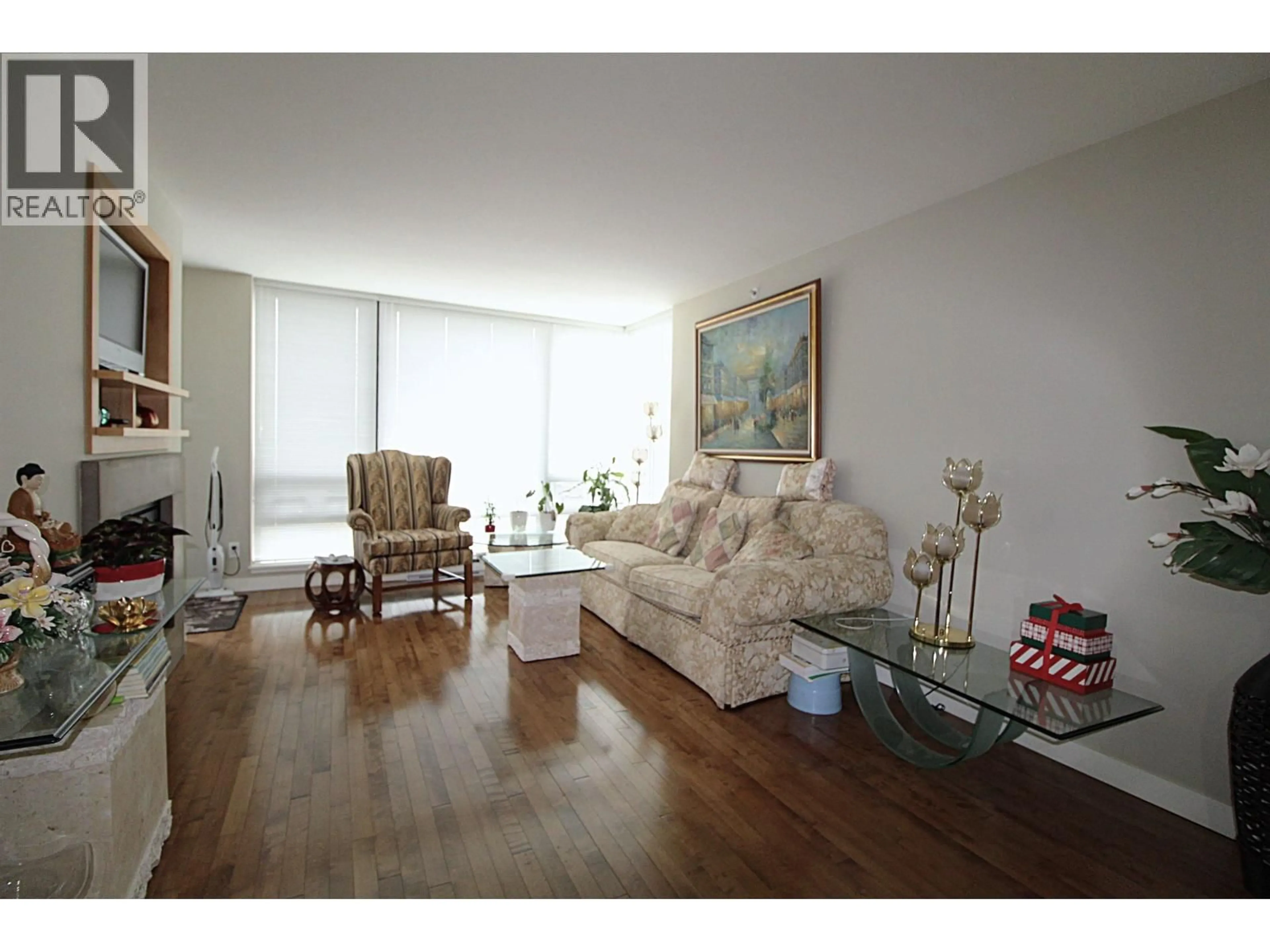 Living room with furniture, wood/laminate floor for 1106 - 9133 HEMLOCK DRIVE, Richmond British Columbia V6Y4J9