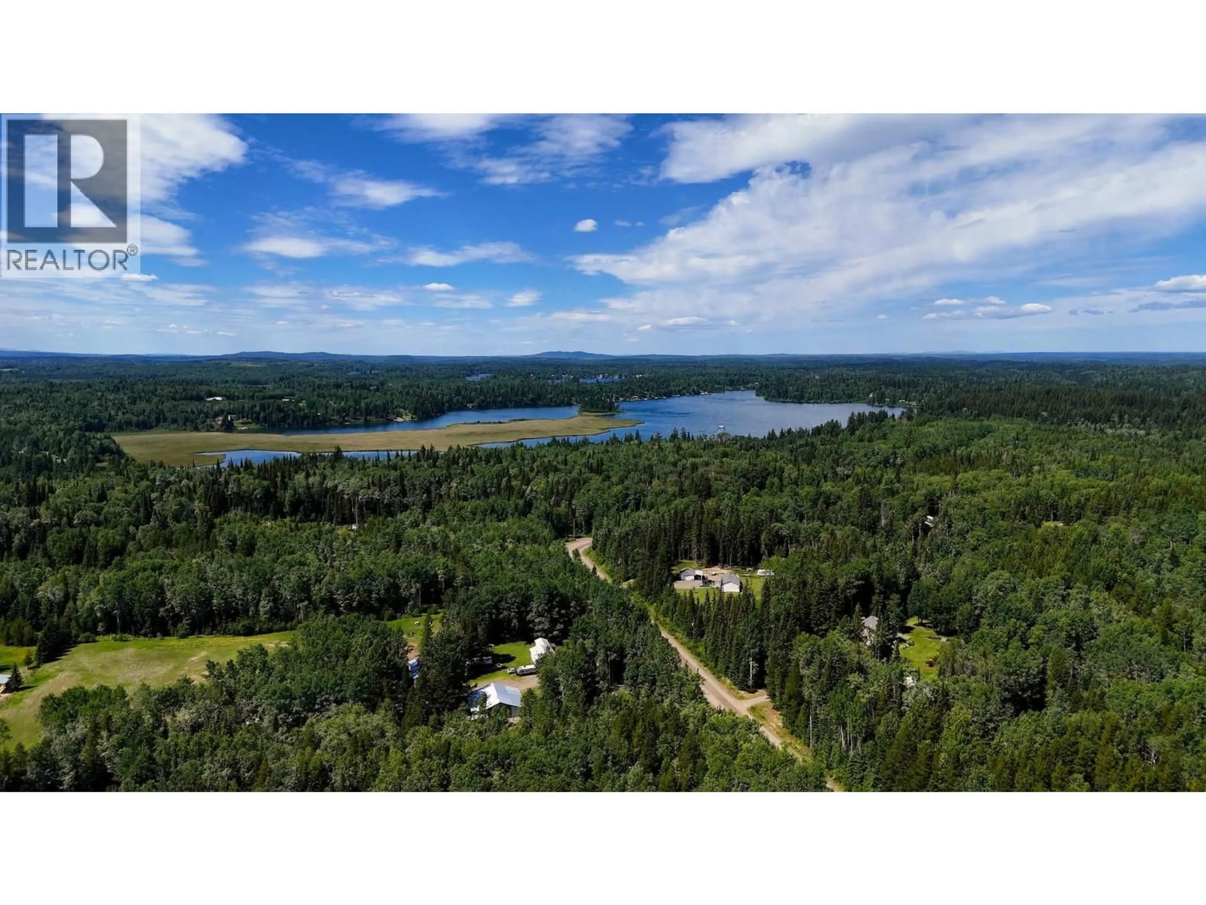 A pic from outside/outdoor area/front of a property/back of a property/a pic from drone, water/lake/river/ocean view for 9340 AUSTGARDEN ROAD, Ness Lake British Columbia V2K5M1