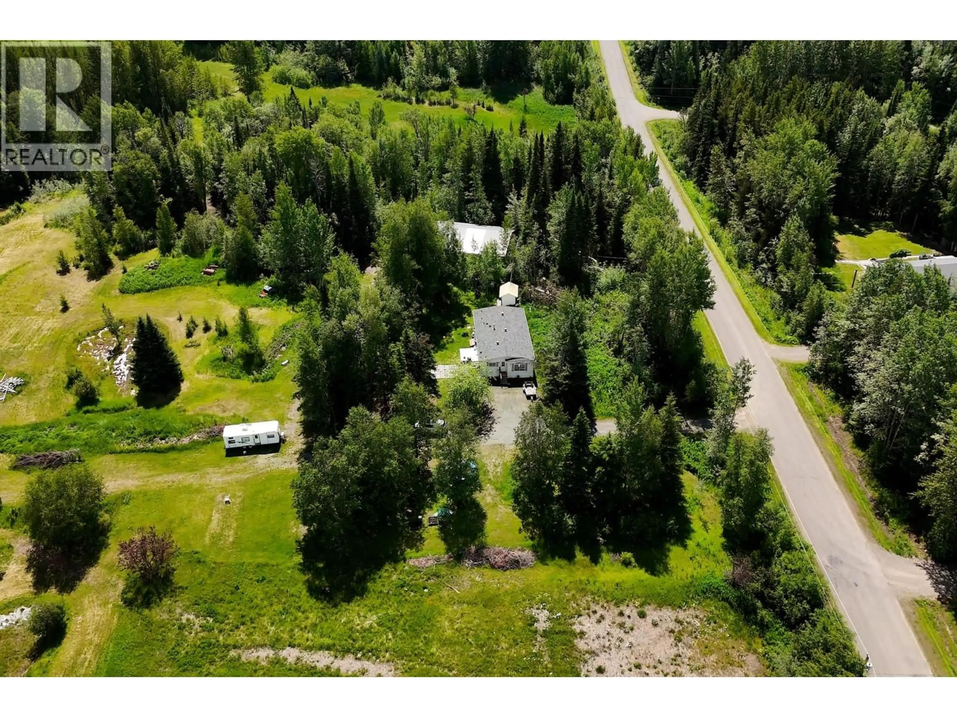 A pic from outside/outdoor area/front of a property/back of a property/a pic from drone, forest/trees view for 9340 AUSTGARDEN ROAD, Ness Lake British Columbia V2K5M1
