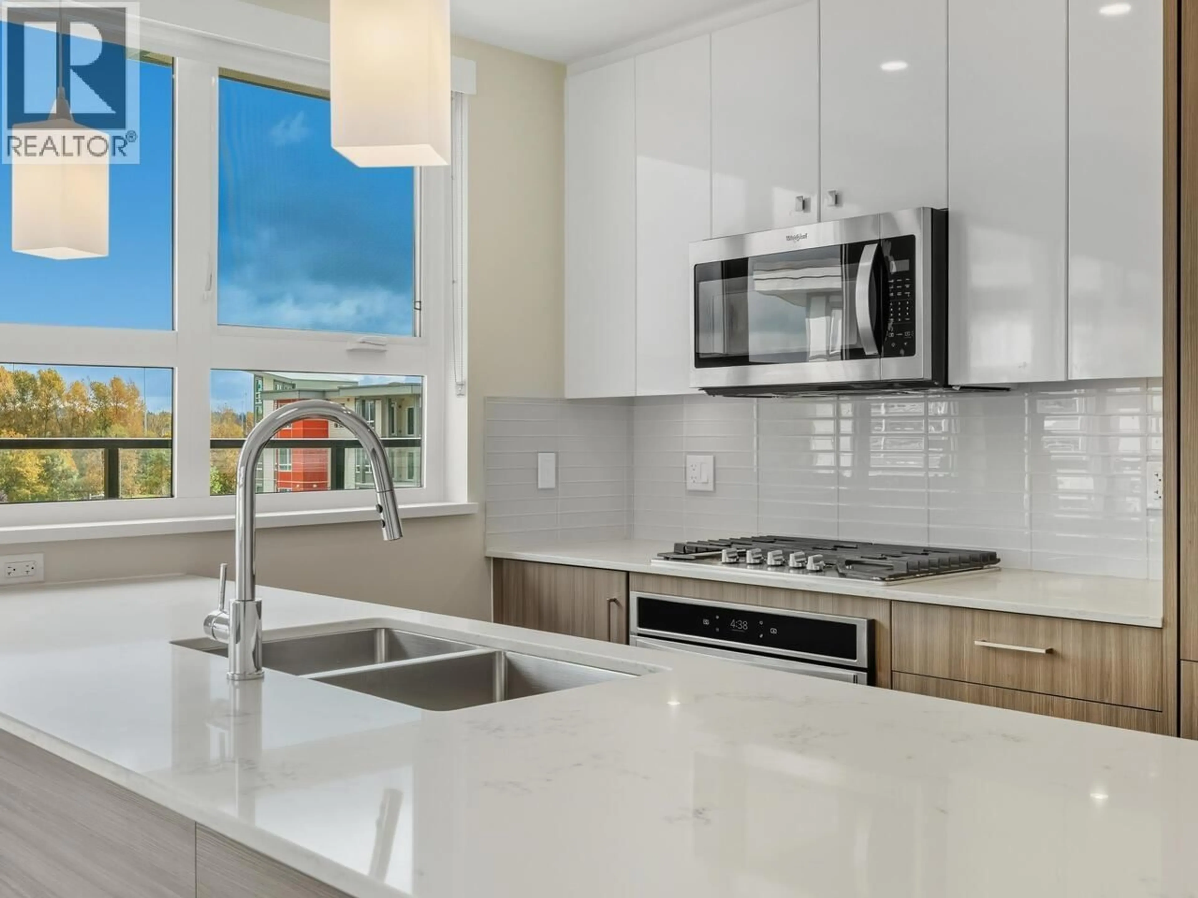 Open concept kitchen, ceramic/tile floor for 401 - 23233 GILLEY ROAD, Richmond British Columbia V6V1E6