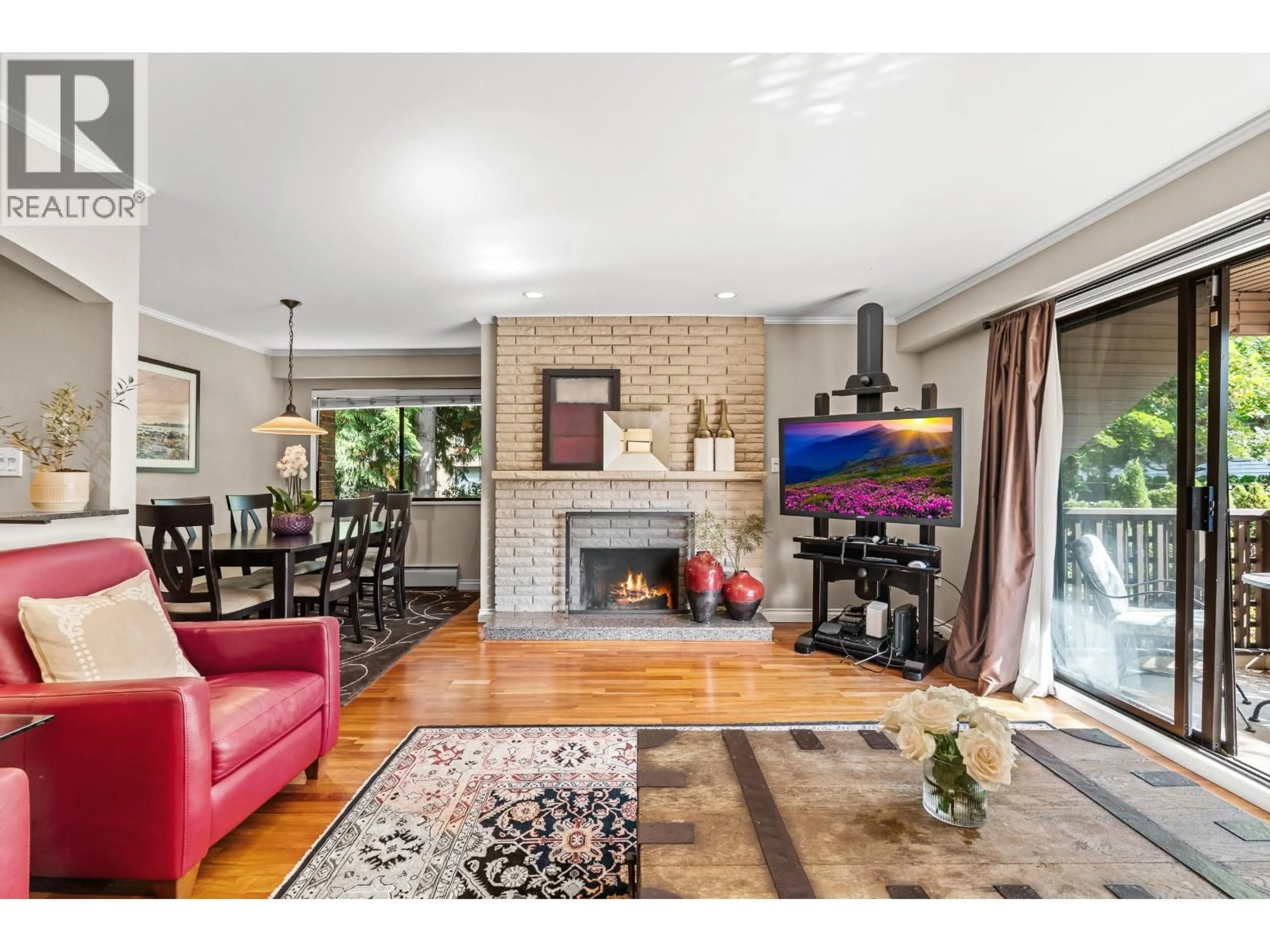 Living room with furniture, wood/laminate floor for 207 - 1750 10TH AVENUE, Vancouver British Columbia V6J2A6