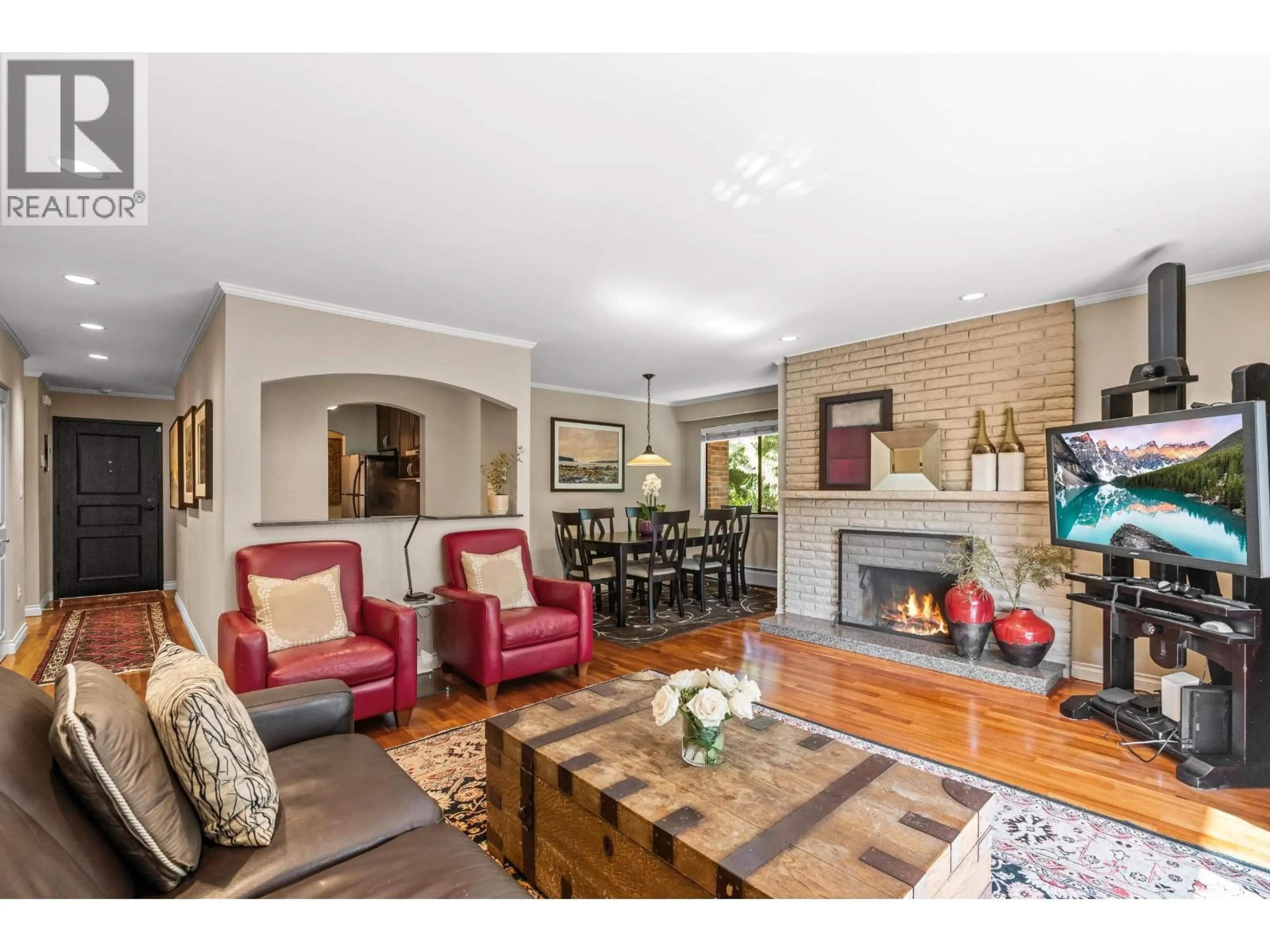 Living room with furniture, wood/laminate floor for 207 - 1750 10TH AVENUE, Vancouver British Columbia V6J2A6