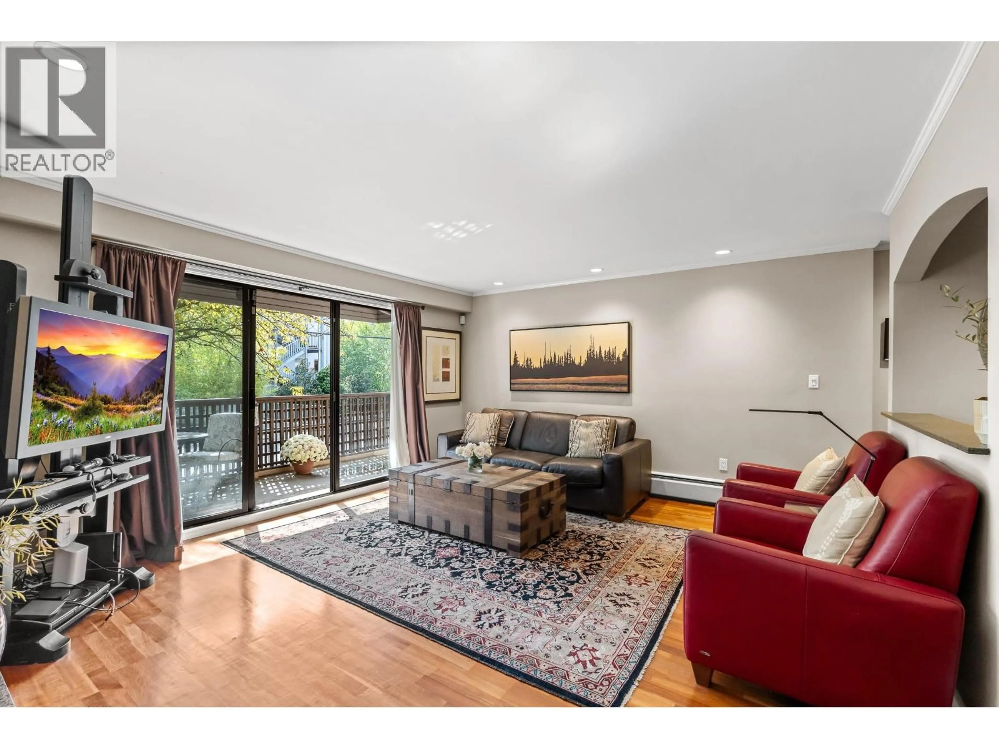 Living room with furniture, wood/laminate floor for 207 - 1750 10TH AVENUE, Vancouver British Columbia V6J2A6