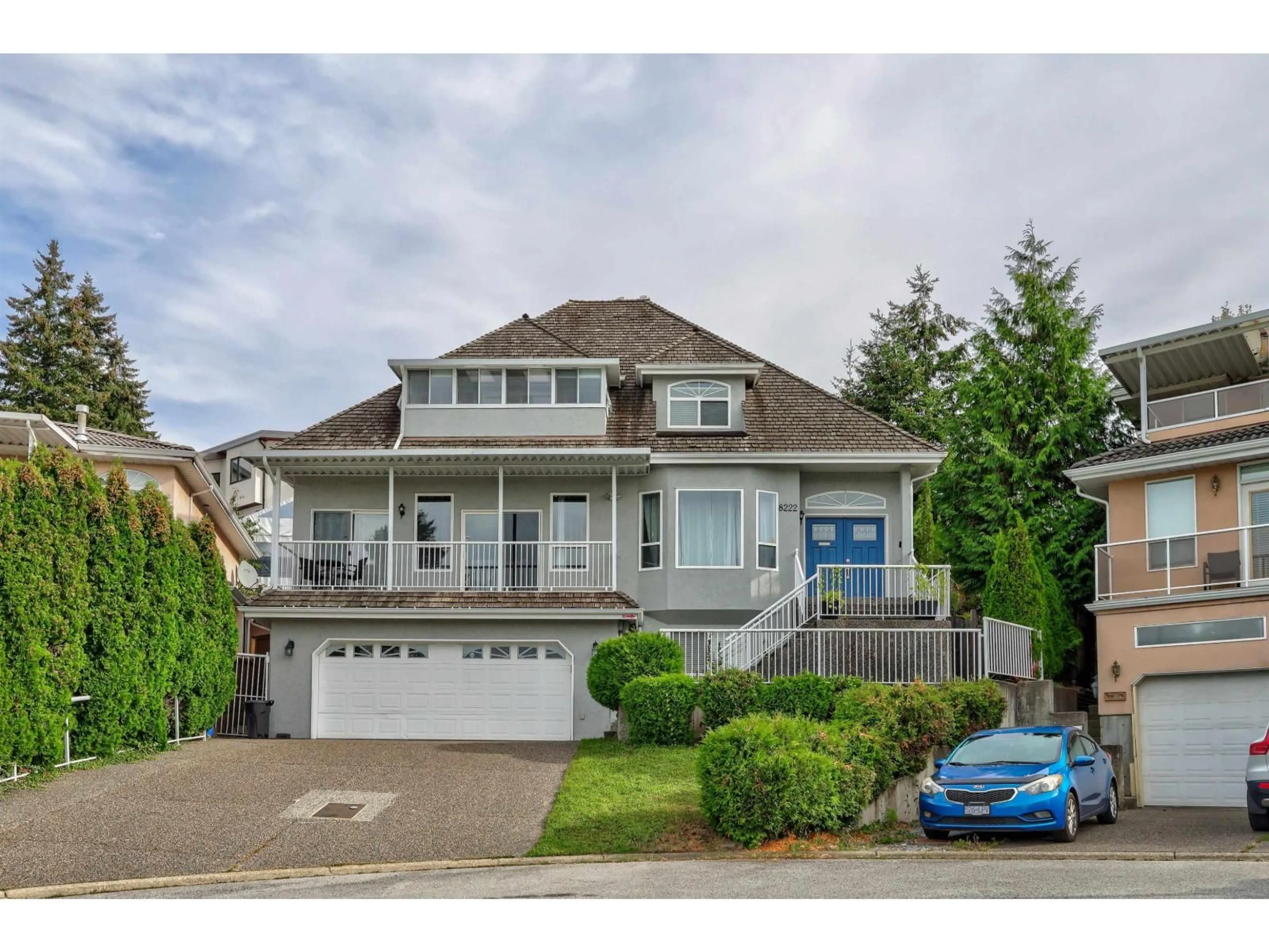 Home with vinyl exterior material, street for 8222 NECHAKO DRIVE, Delta British Columbia V4C3X3