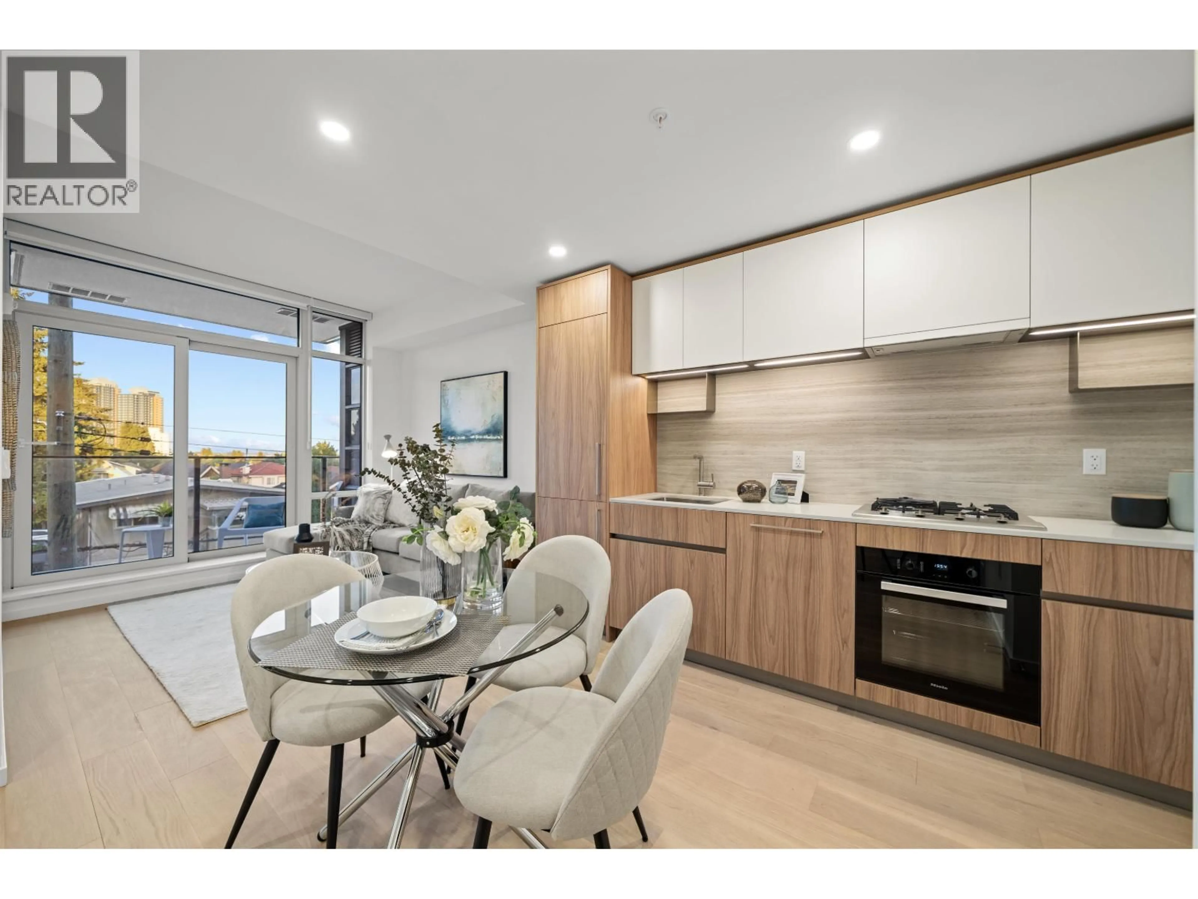 Open concept kitchen, unknown for 206 - 8486 OAK STREET, Vancouver British Columbia V6P4B1