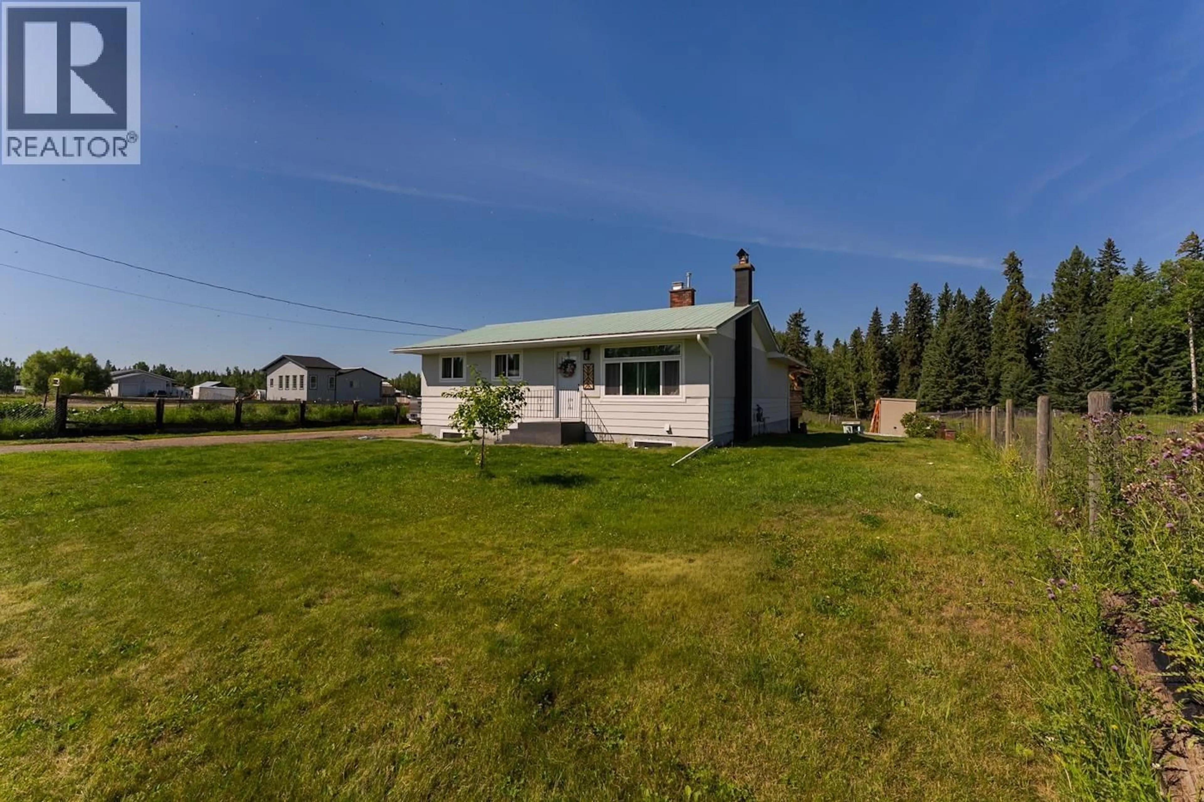A pic from outside/outdoor area/front of a property/back of a property/a pic from drone, water/lake/river/ocean view for 8805 CHILCOTIN ROAD, Prince George British Columbia V2N5V9