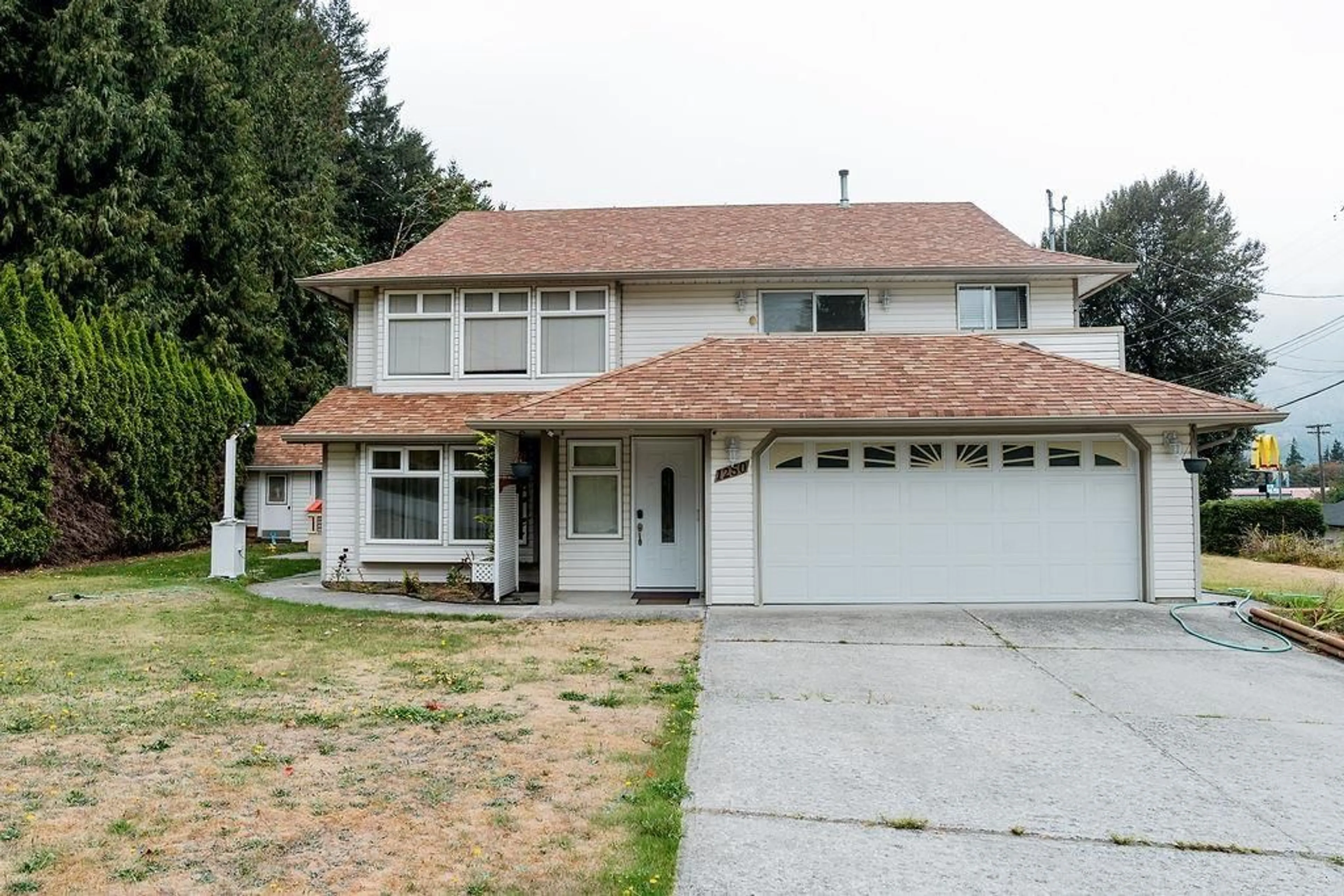 Home with vinyl exterior material, street for 1250 RYDER STREET, Hope British Columbia V0X1L4