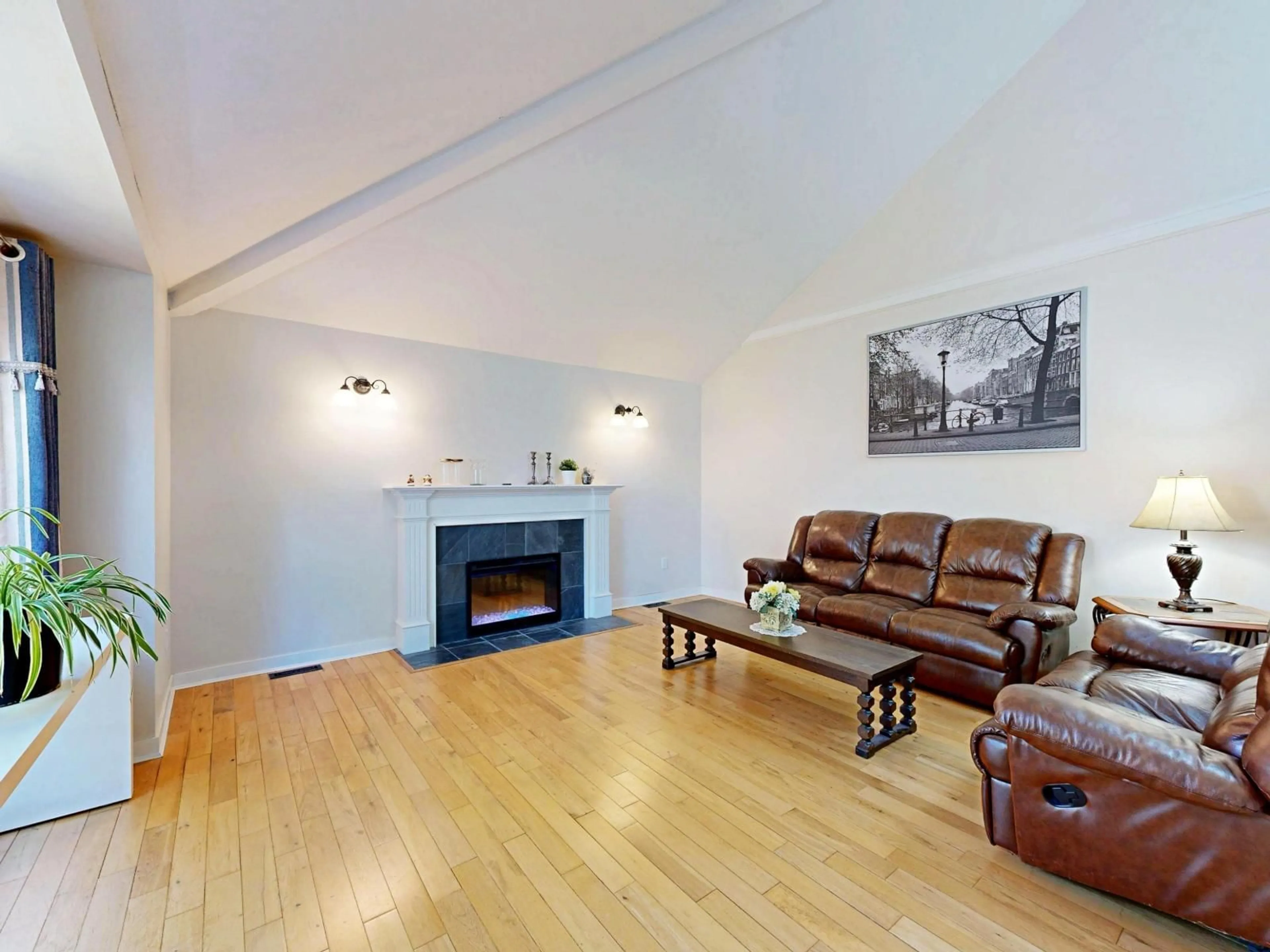 Living room with furniture, wood/laminate floor for 10285 167 STREET, Surrey British Columbia V4N1Z2