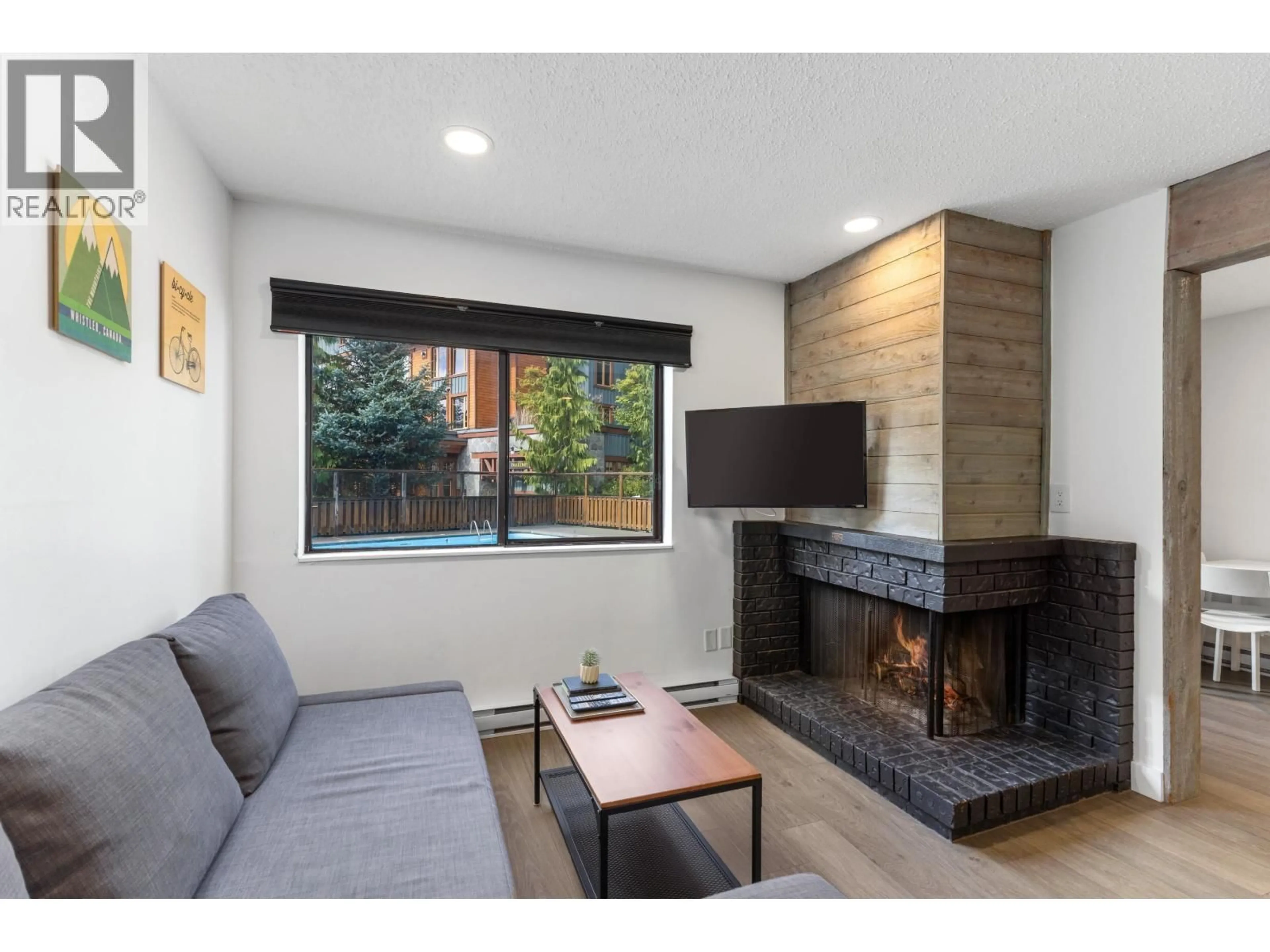 Living room with furniture, unknown for 104 - 2129 LAKE PLACID ROAD, Whistler British Columbia V8E0N4