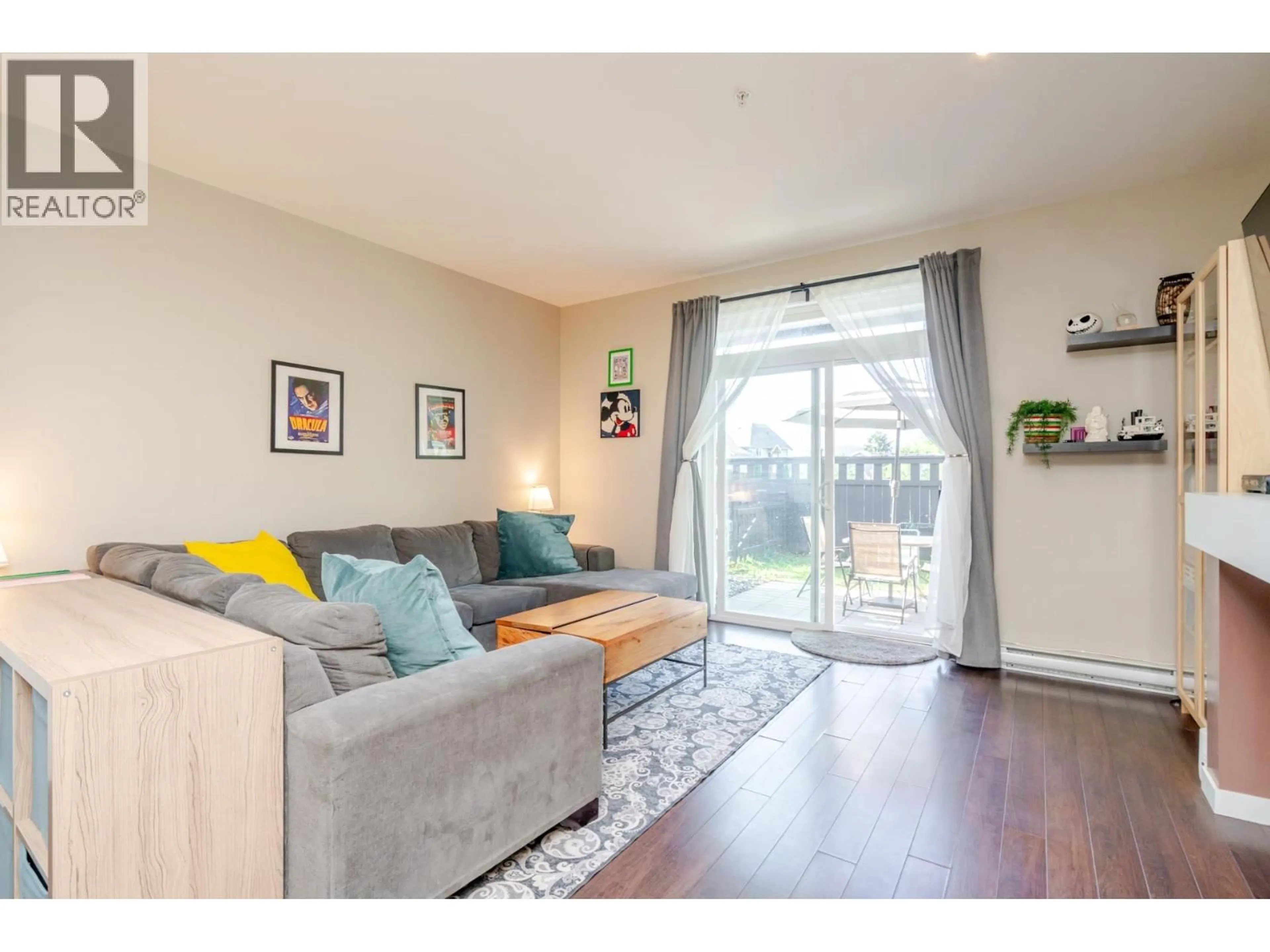 Living room with furniture, wood/laminate floor for 99 - 13819 232 STREET, Maple Ridge British Columbia V4R0C7