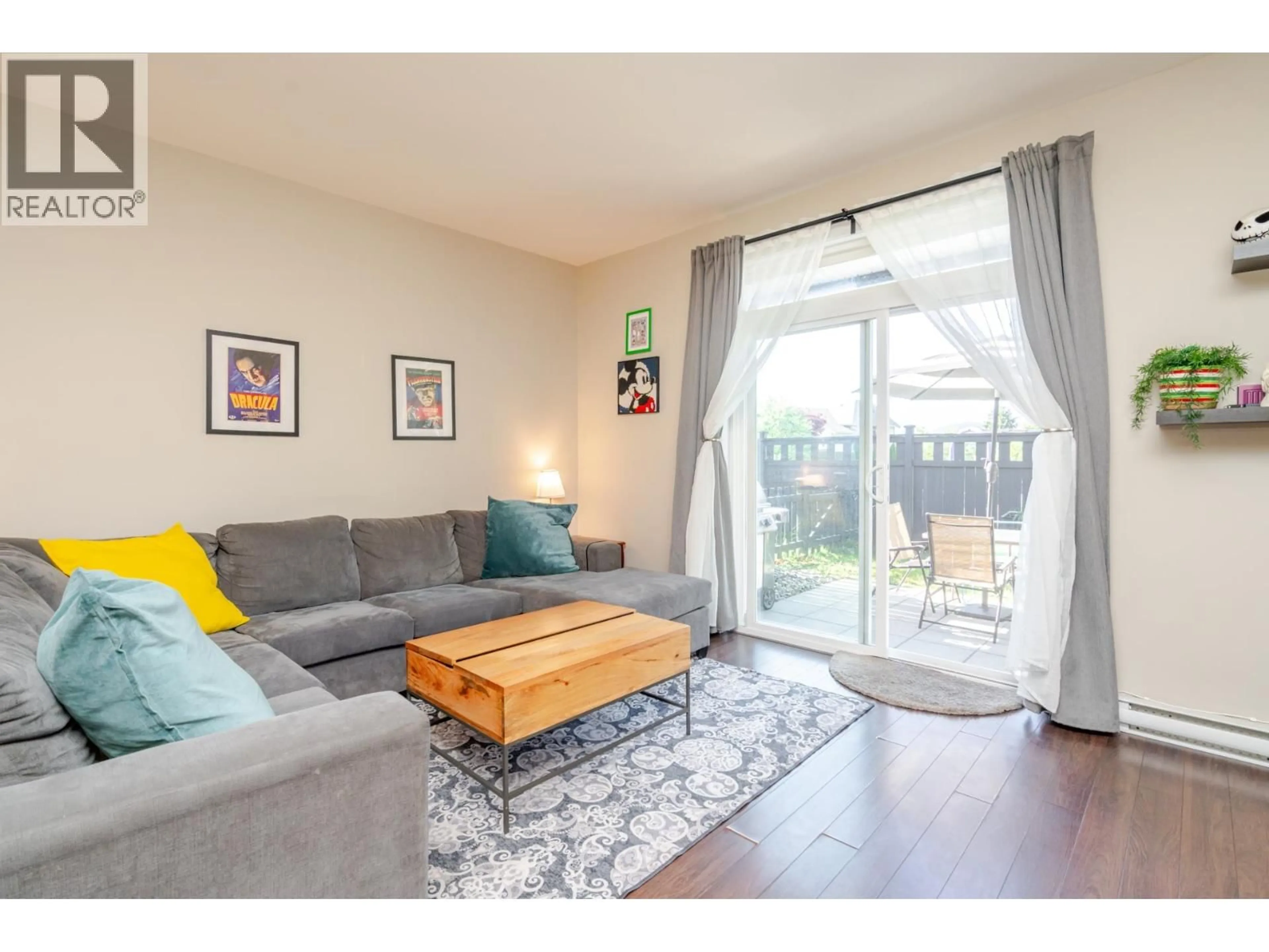 Living room with furniture, wood/laminate floor for 99 - 13819 232 STREET, Maple Ridge British Columbia V4R0C7