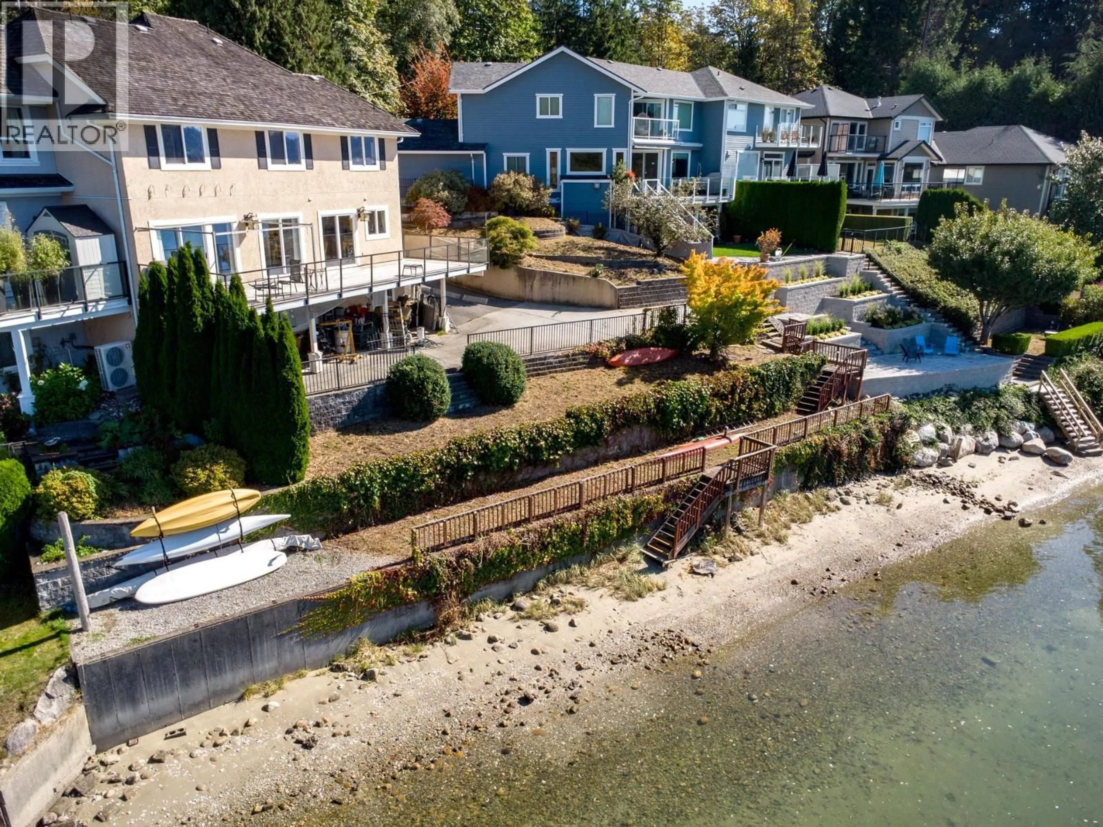 A pic from outside/outdoor area/front of a property/back of a property/a pic from drone, water/lake/river/ocean view for 1678 BEACH AVENUE, Port Moody British Columbia V3H3M1