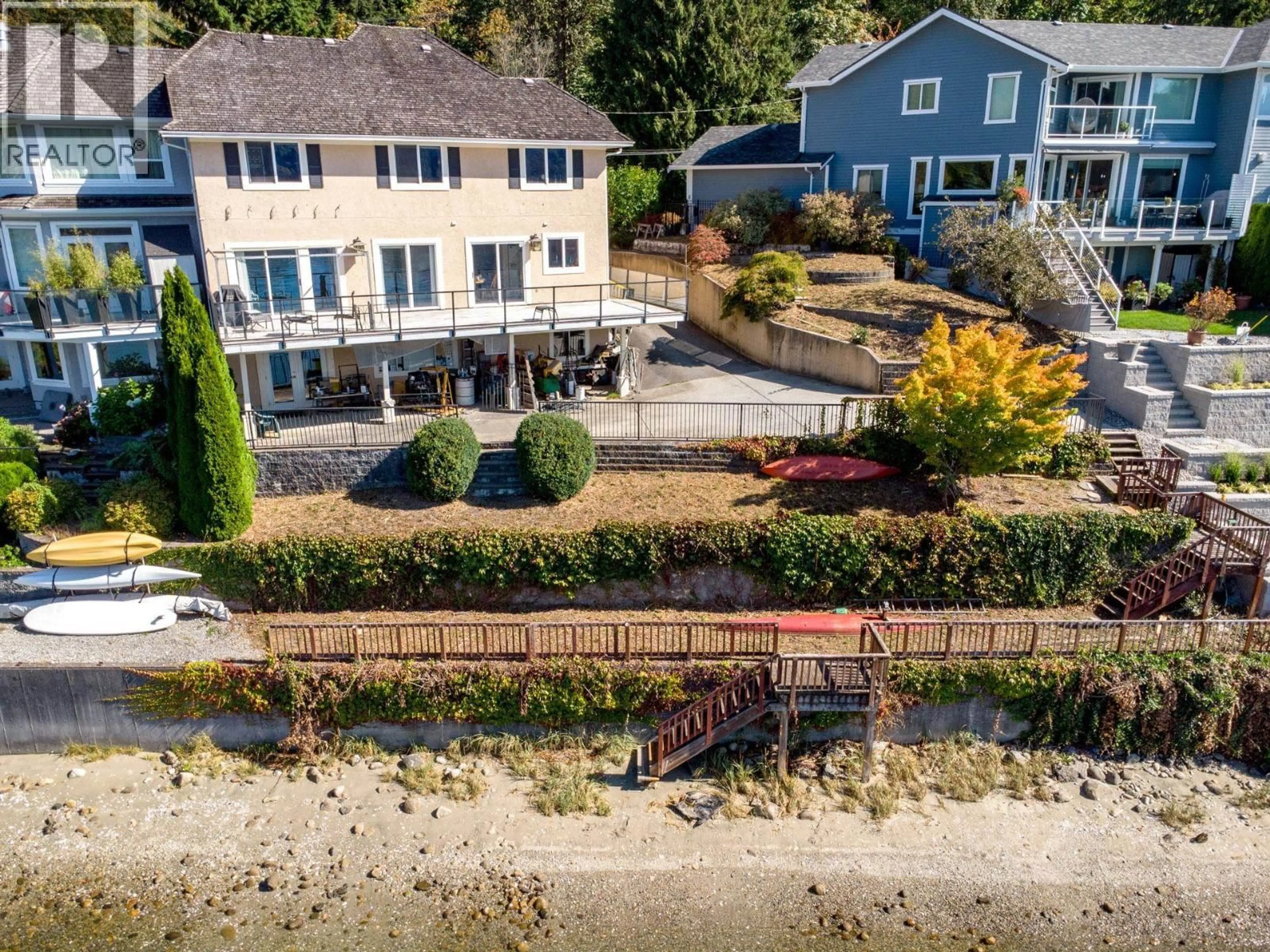 A pic from outside/outdoor area/front of a property/back of a property/a pic from drone, water/lake/river/ocean view for 1678 BEACH AVENUE, Port Moody British Columbia V3H3M1
