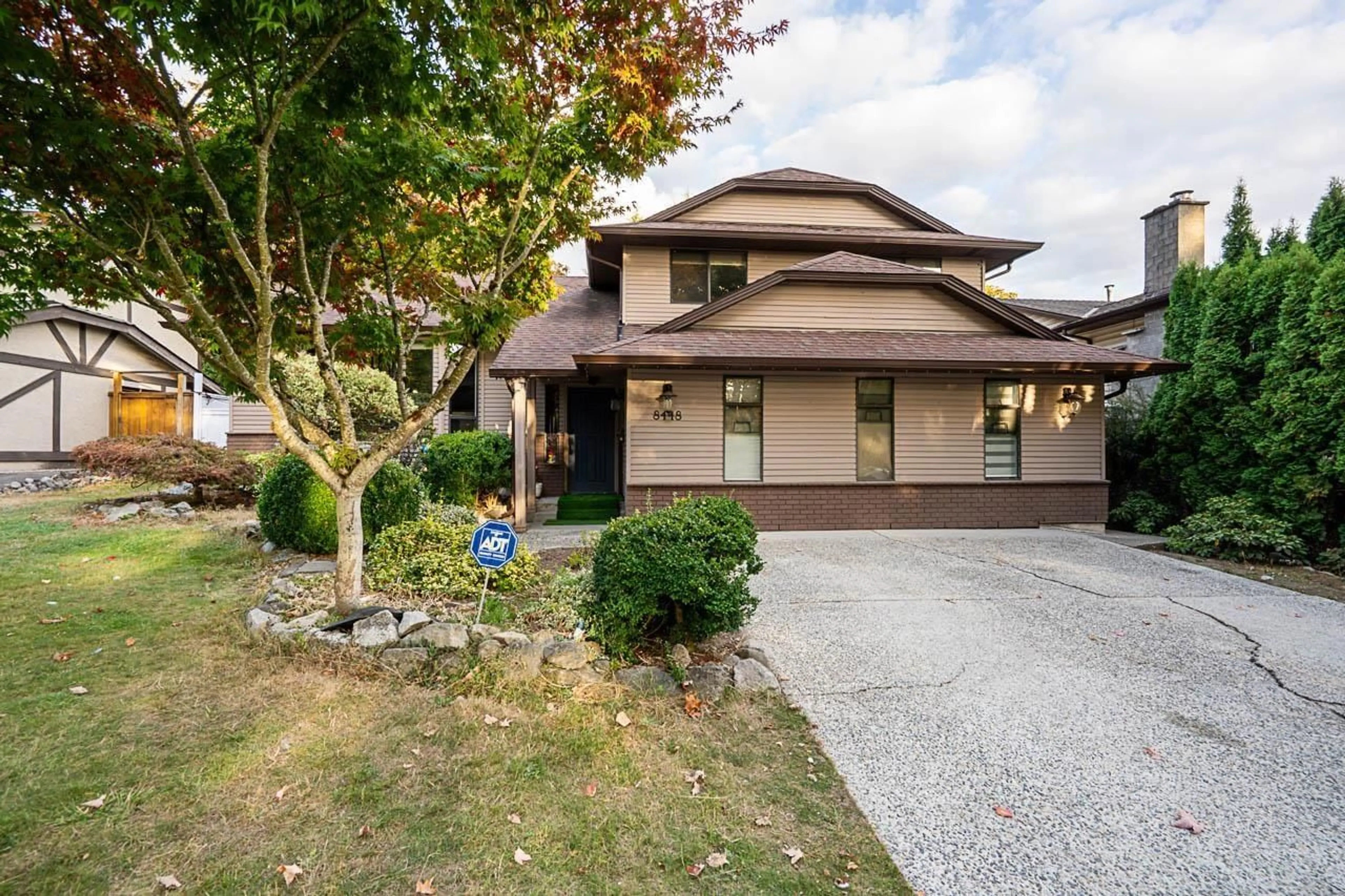 Home with vinyl exterior material, street for 8448 154 STREET, Surrey British Columbia V3S6H3
