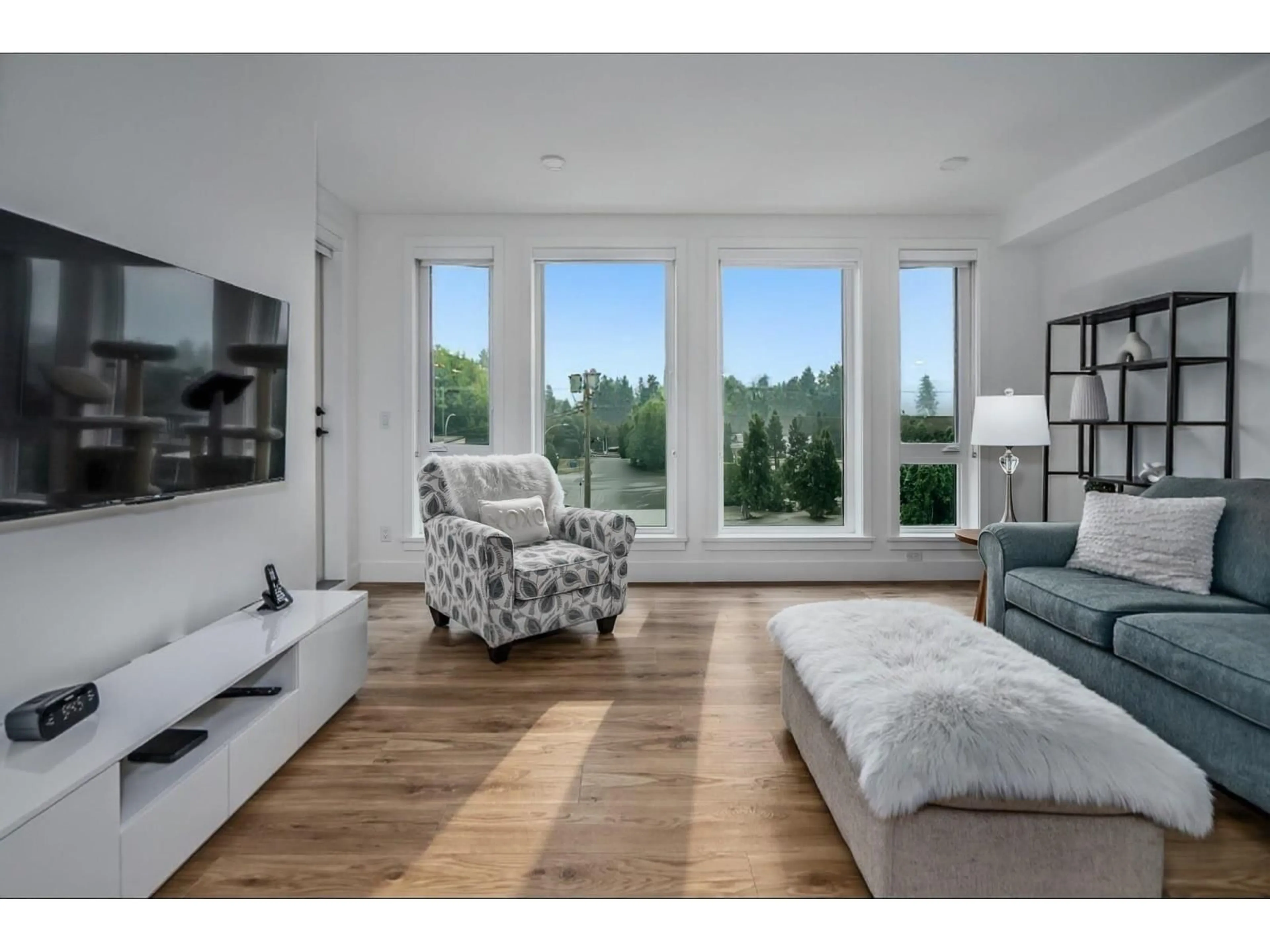 Living room with furniture, unknown for 301 - 33160 PLAXTON CRESCENT, Abbotsford British Columbia V2Y3J6