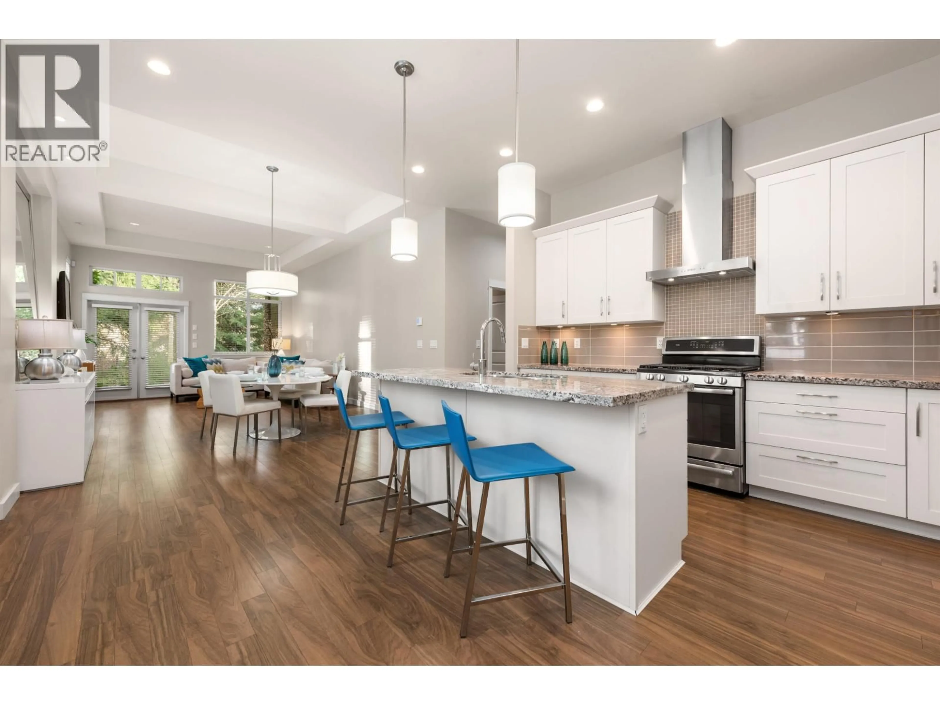 Open concept kitchen, wood/laminate floor for 5090 SPRINGS BOULEVARD, Delta British Columbia V4M0A6