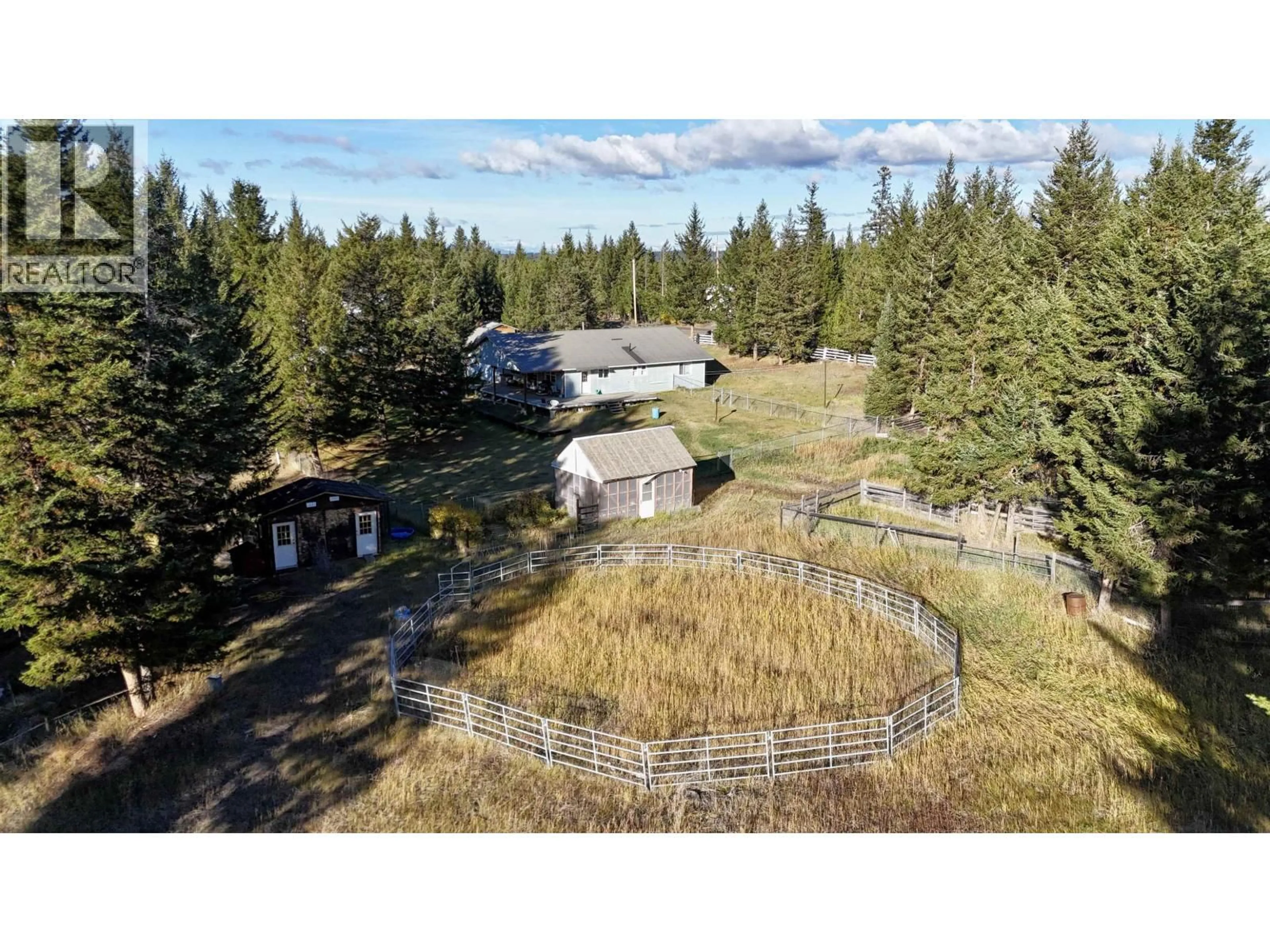 A pic from outside/outdoor area/front of a property/back of a property/a pic from drone, forest/trees view for 6784 BARNETT ROAD, 100 Mile House British Columbia V0K2E2