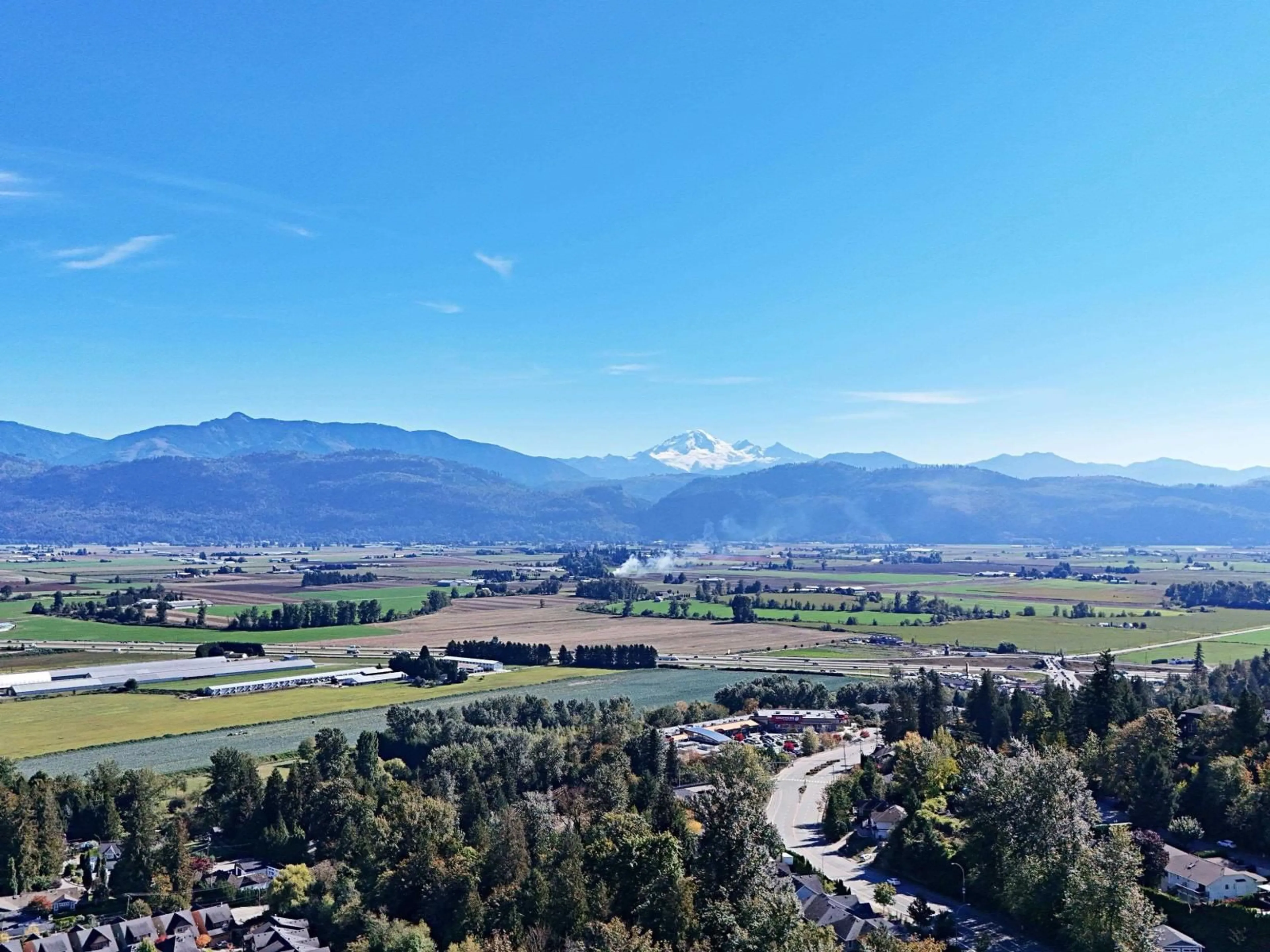 A pic from outside/outdoor area/front of a property/back of a property/a pic from drone, mountain view for 35954 REGAL PARK WAY, Abbotsford British Columbia V3G1L3