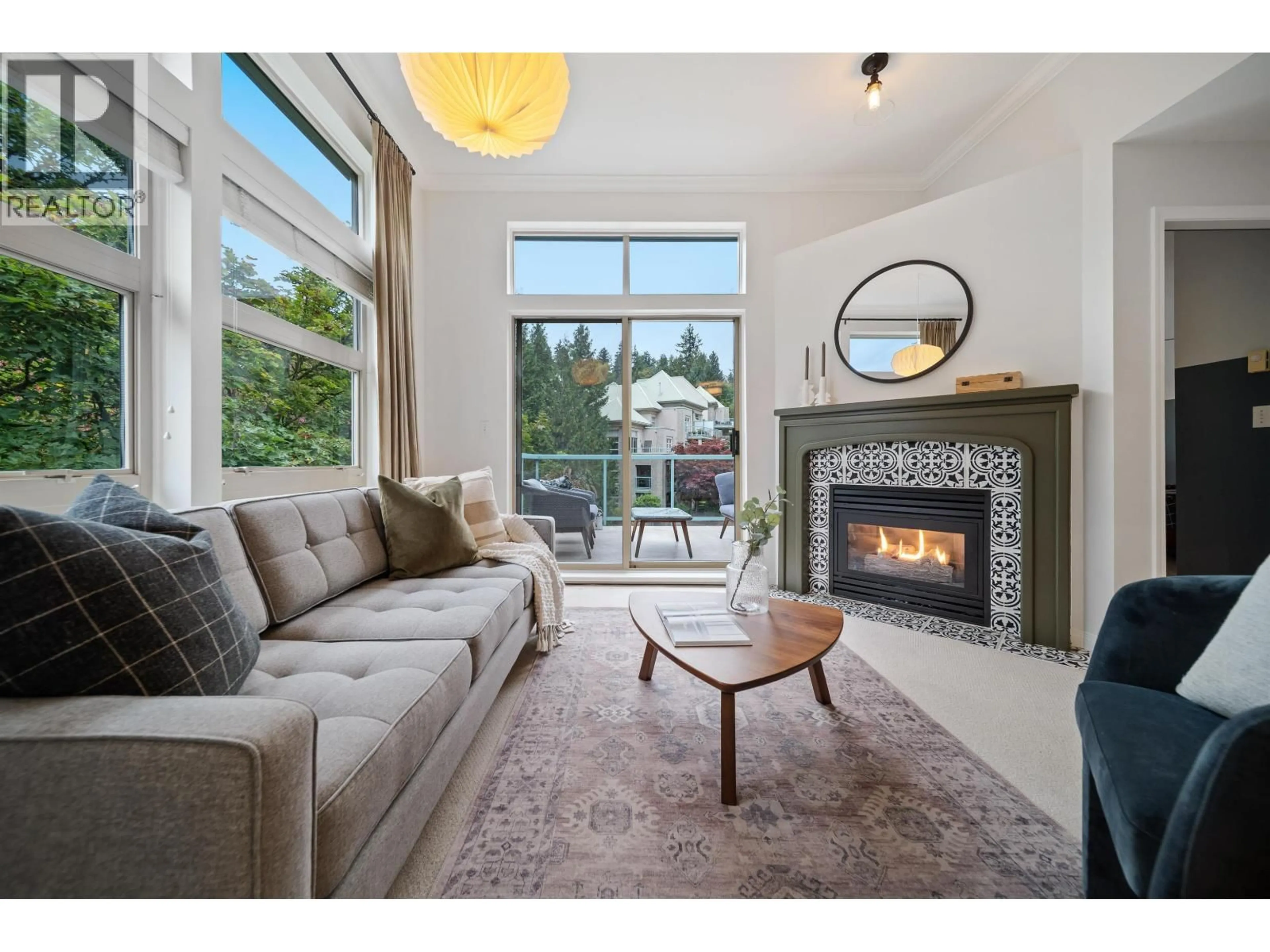 Living room with furniture, unknown for 409 - 301 MAUDE ROAD, Port Moody British Columbia V3H5B1