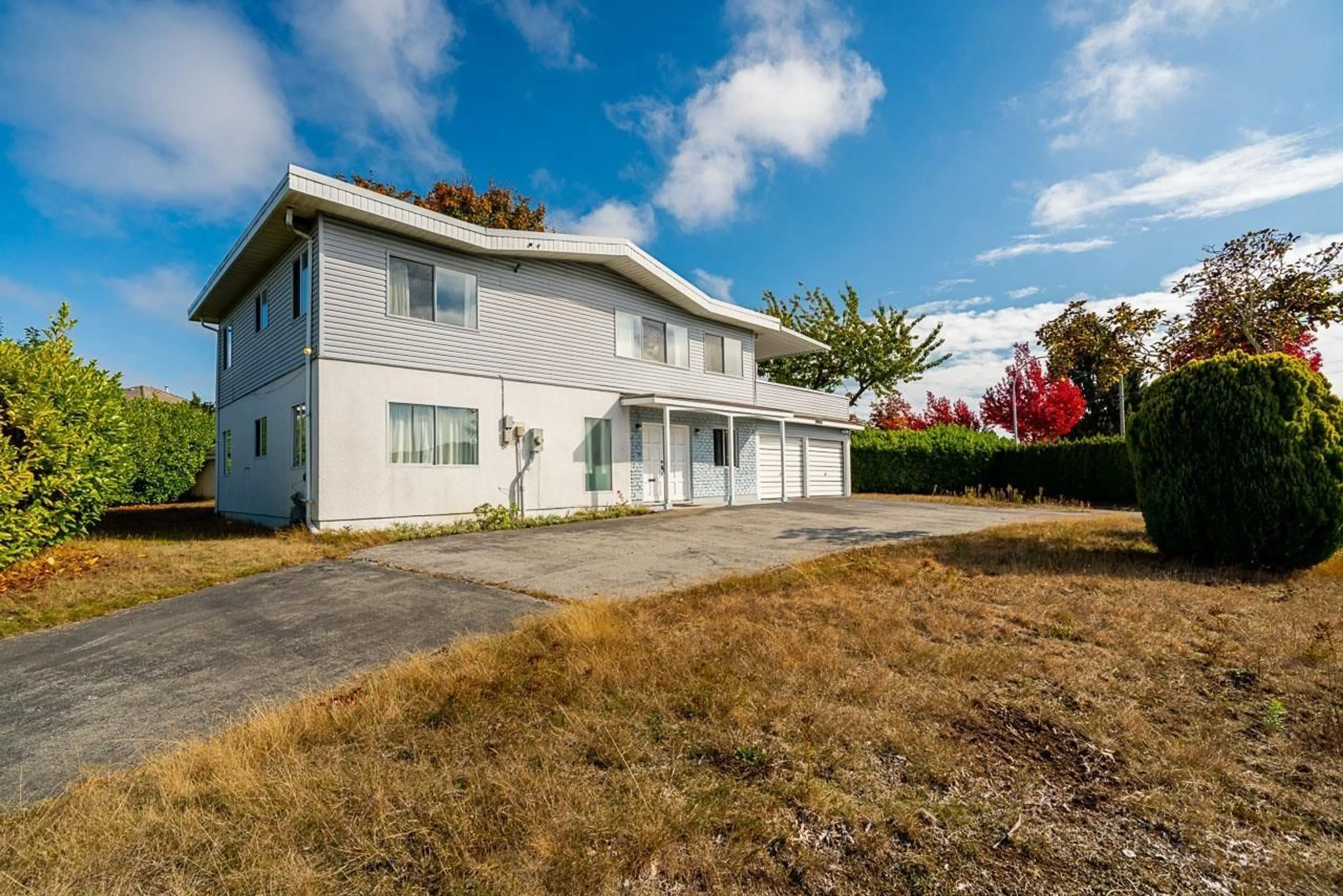 A pic from outside/outdoor area/front of a property/back of a property/a pic from drone, building for 12209 64 AVENUE, Surrey British Columbia V3W1W6