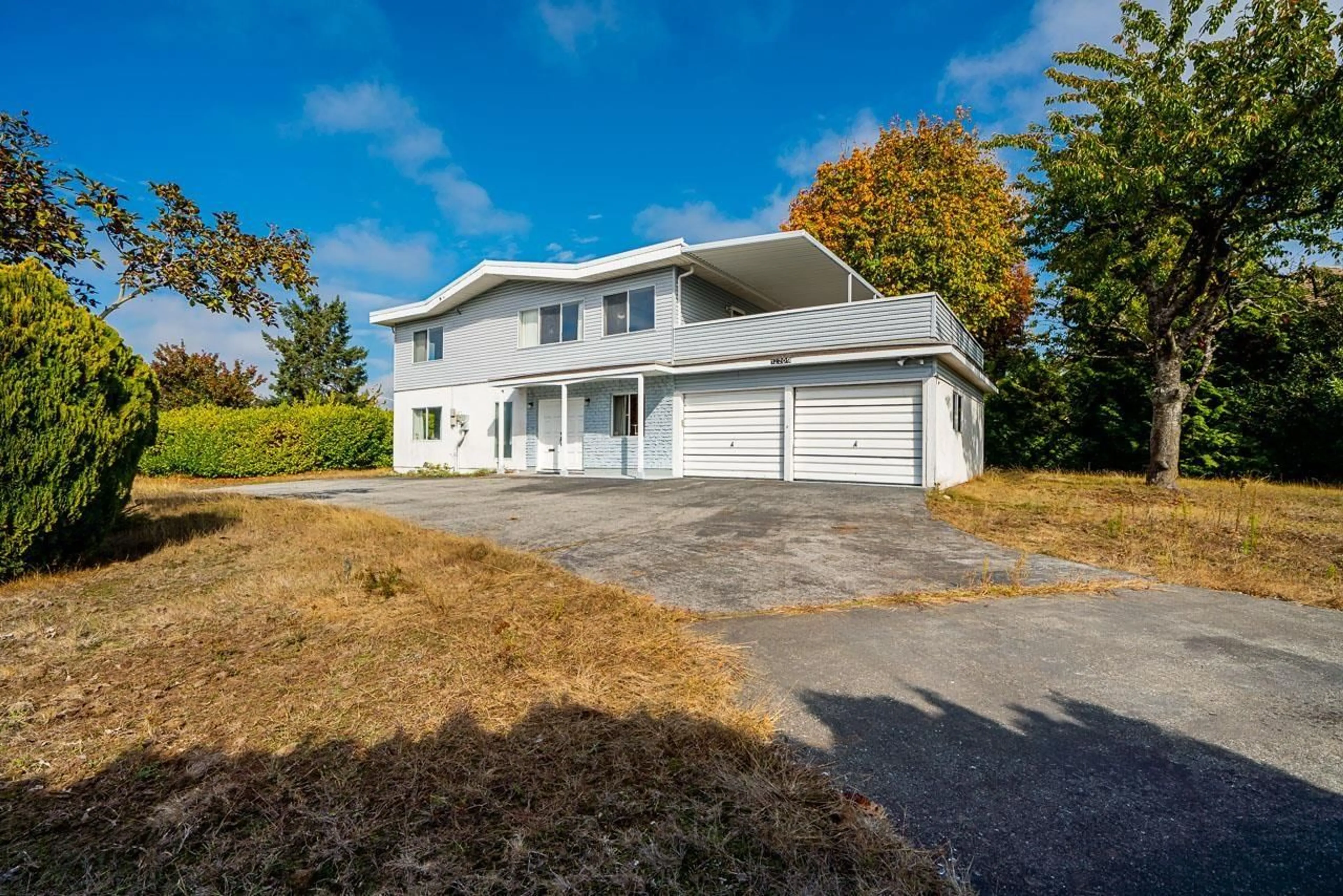 A pic from outside/outdoor area/front of a property/back of a property/a pic from drone, unknown for 12209 64 AVENUE, Surrey British Columbia V3W1W6