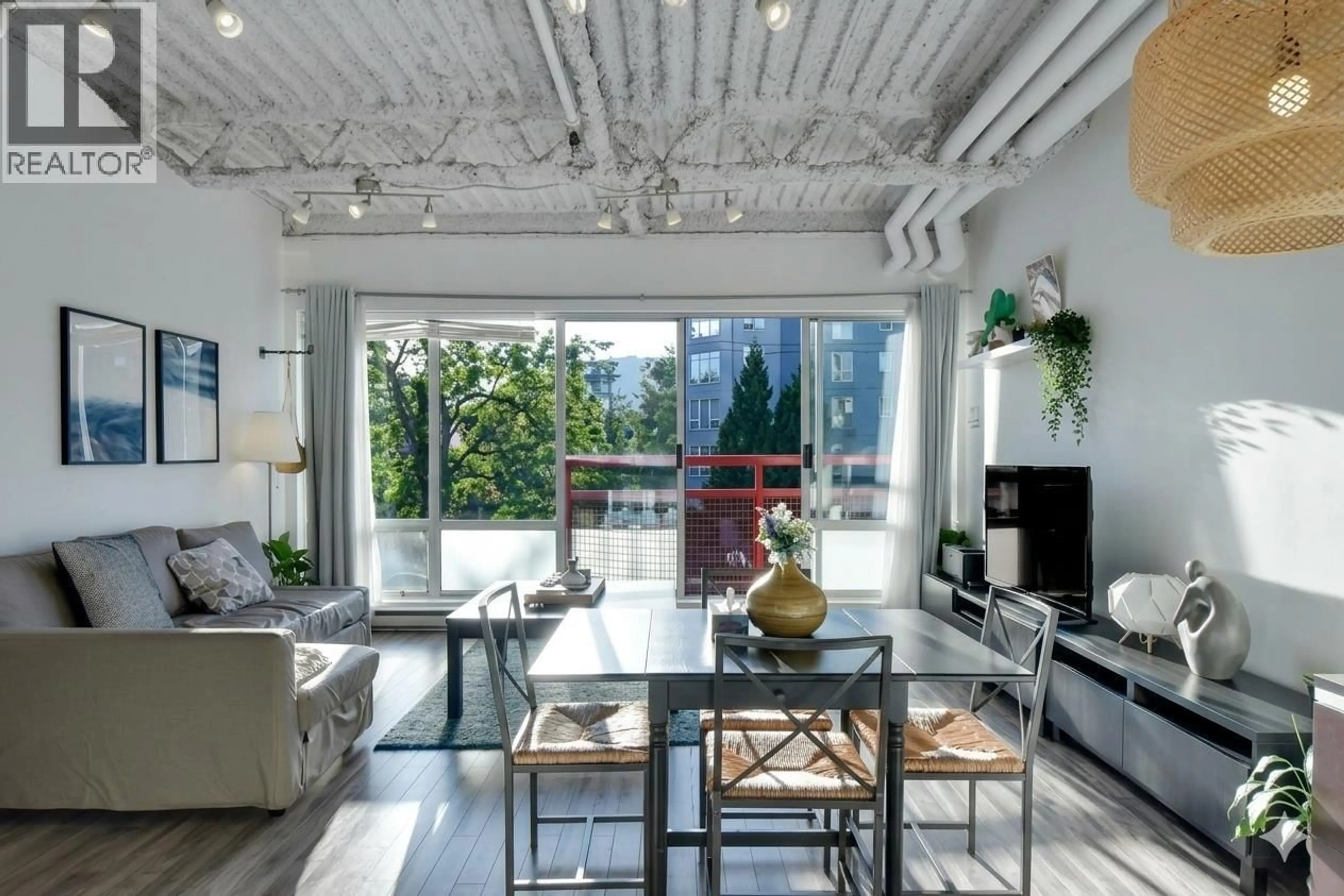 Living room with furniture, cement floor for 305 - 350 2ND AVENUE, Vancouver British Columbia V5T4R8