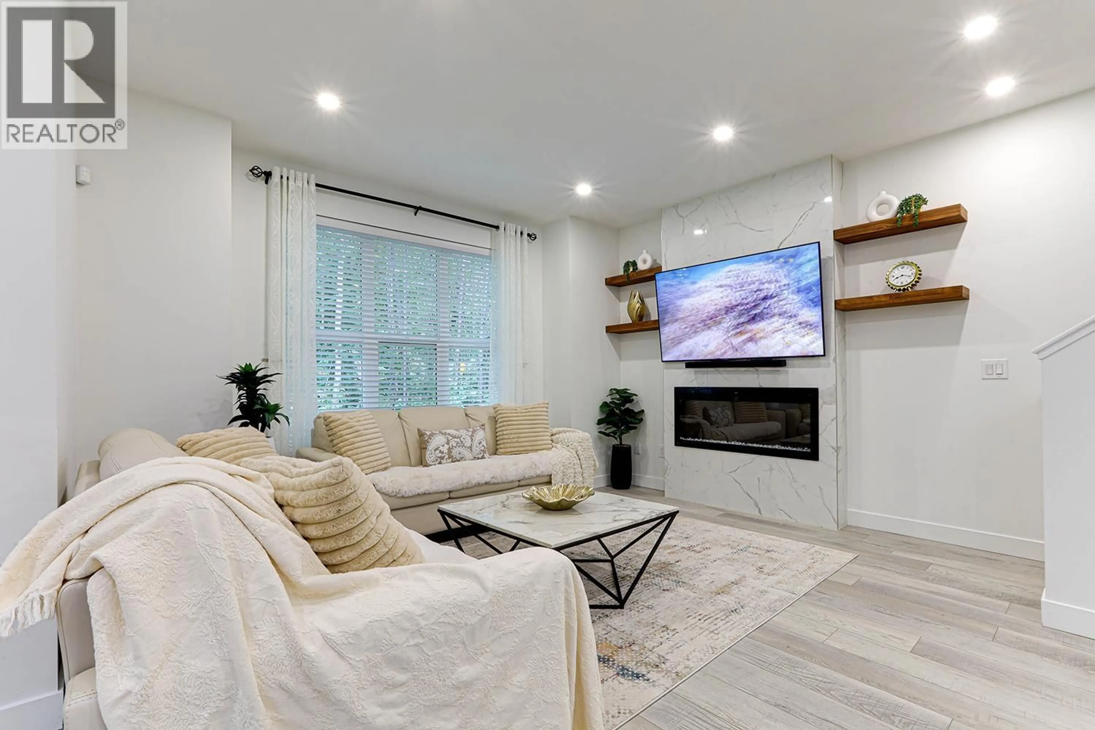Living room with furniture, wood/laminate floor for 1437 COLLINS ROAD, Coquitlam British Columbia V3E0A9