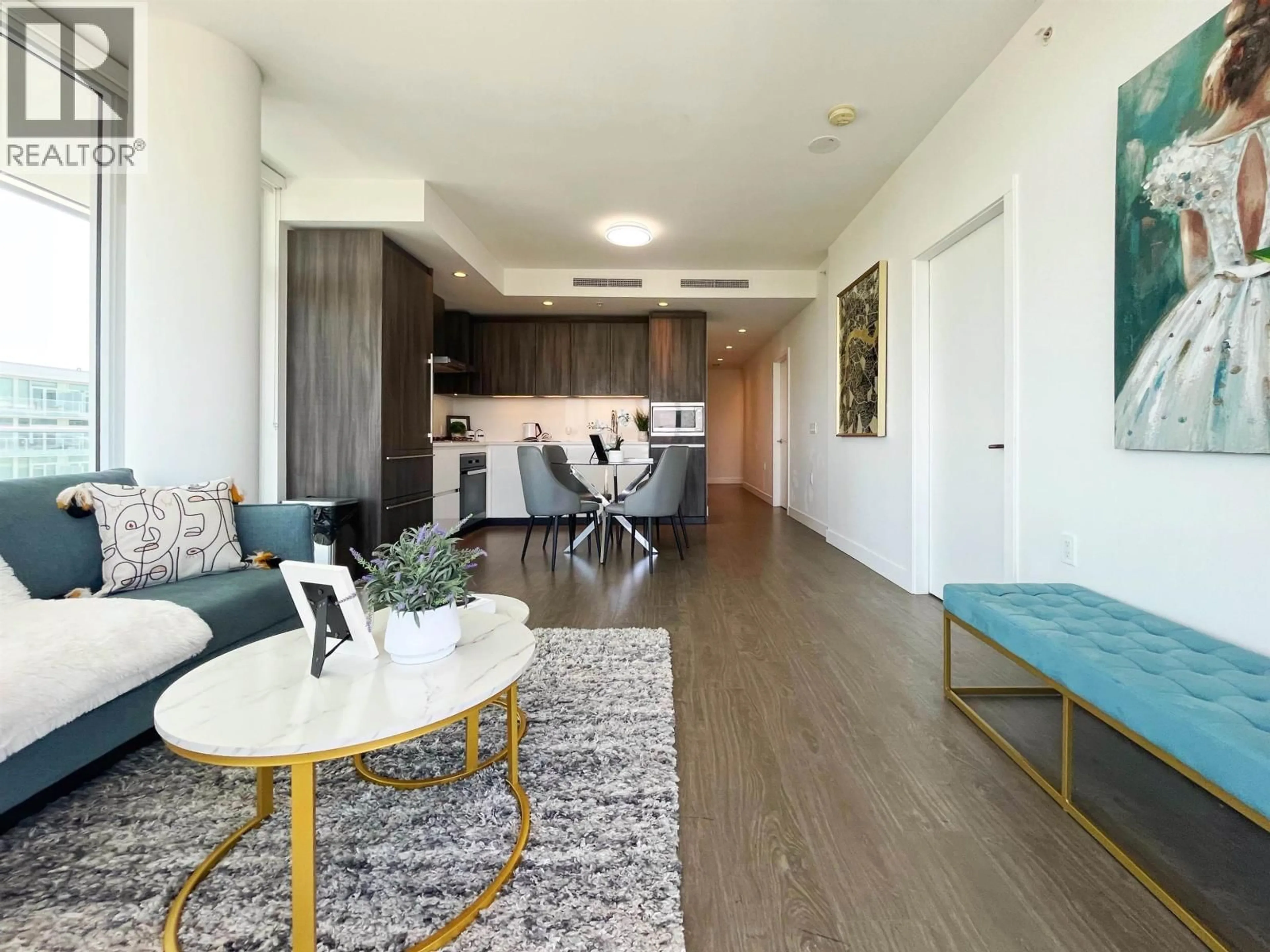 Living room with furniture, wood/laminate floor for 1407 - 6328 NO. 3 ROAD, Richmond British Columbia V6Y0L6