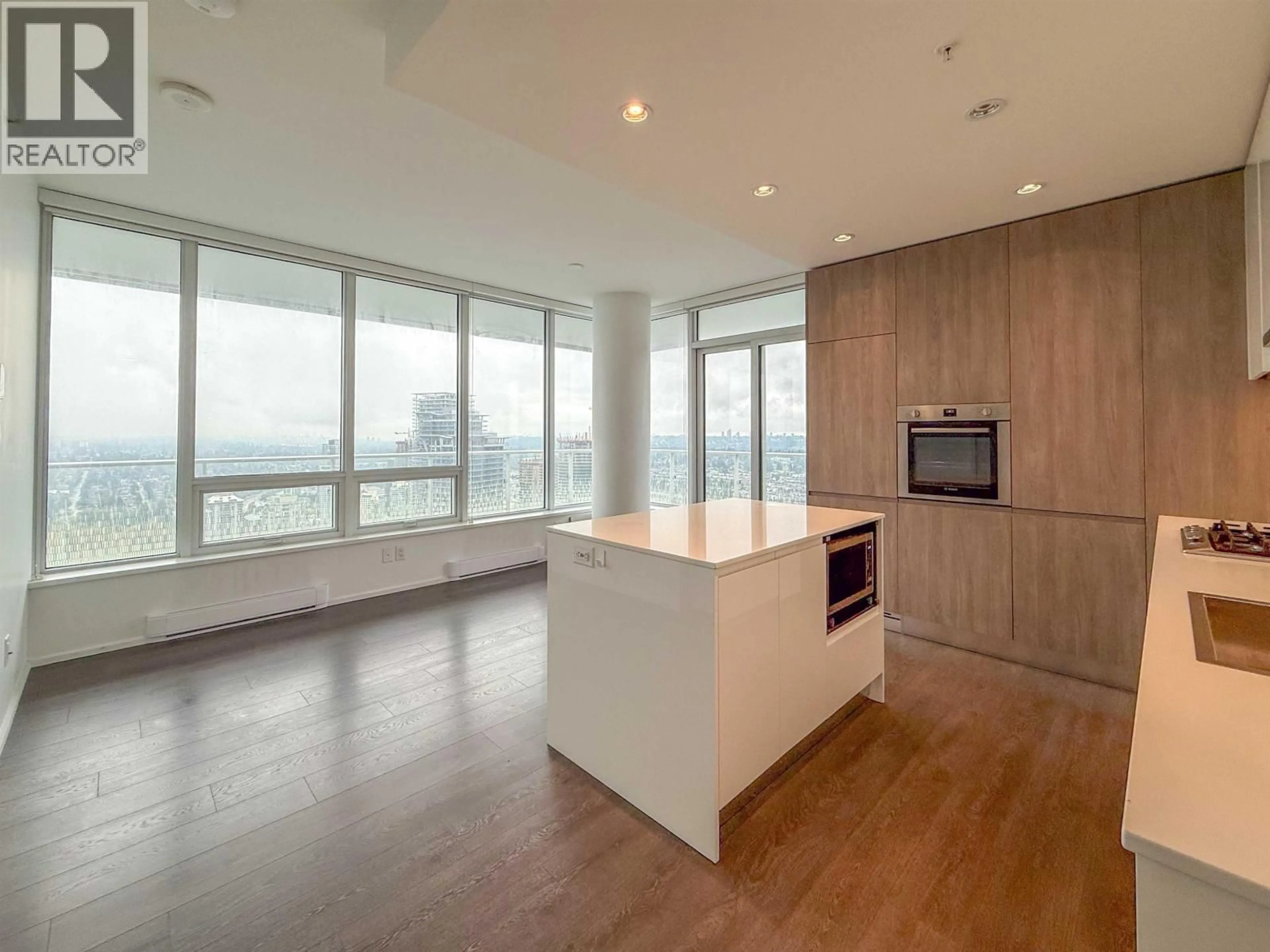 Open concept kitchen, wood/laminate floor for 4002 - 4650 BRENTWOOD BOULEVARD, Burnaby British Columbia V5C0M3