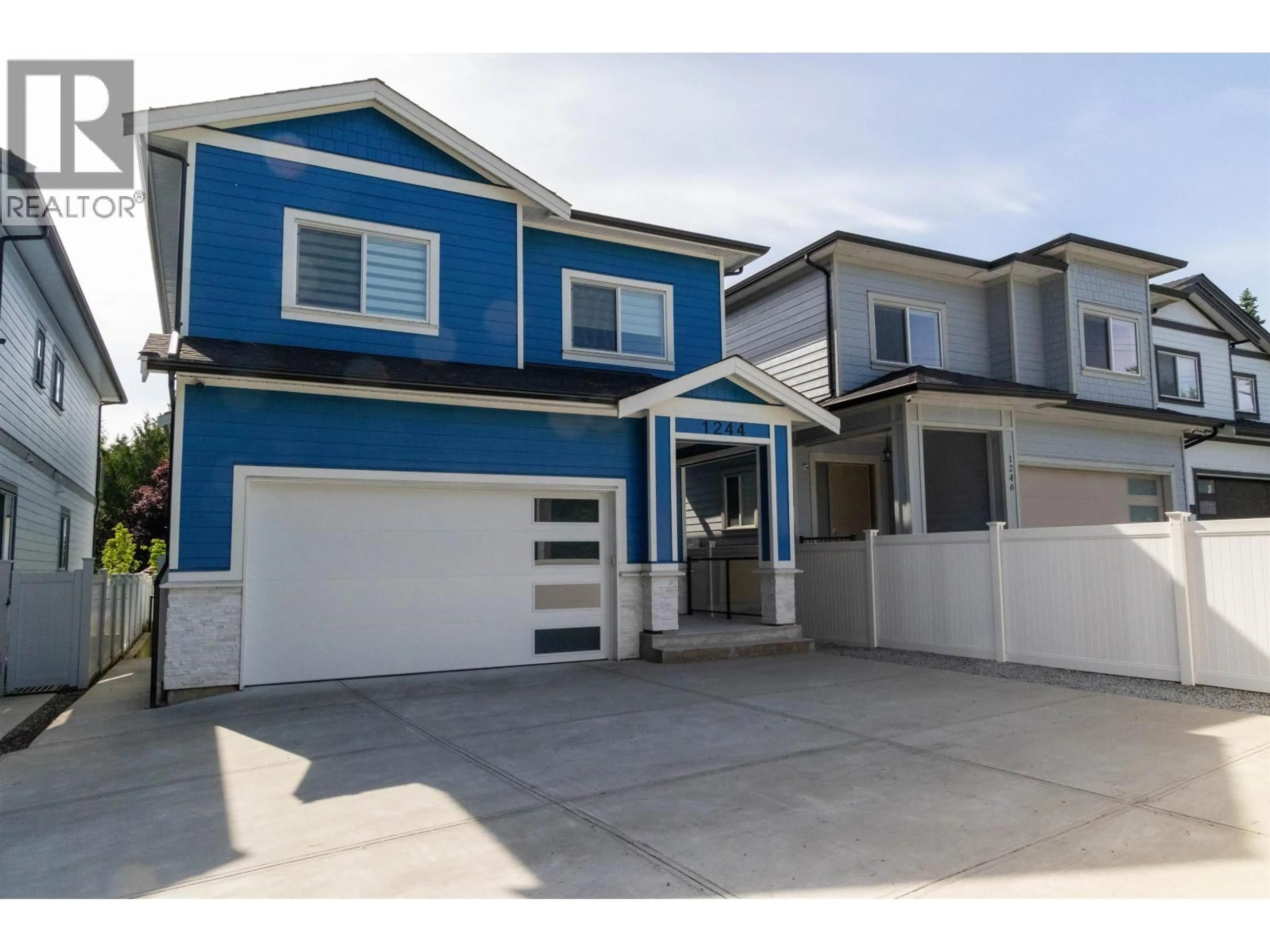 Home with vinyl exterior material, street for 1244 PITT RIVER ROAD, Port Coquitlam British Columbia V3C1N5