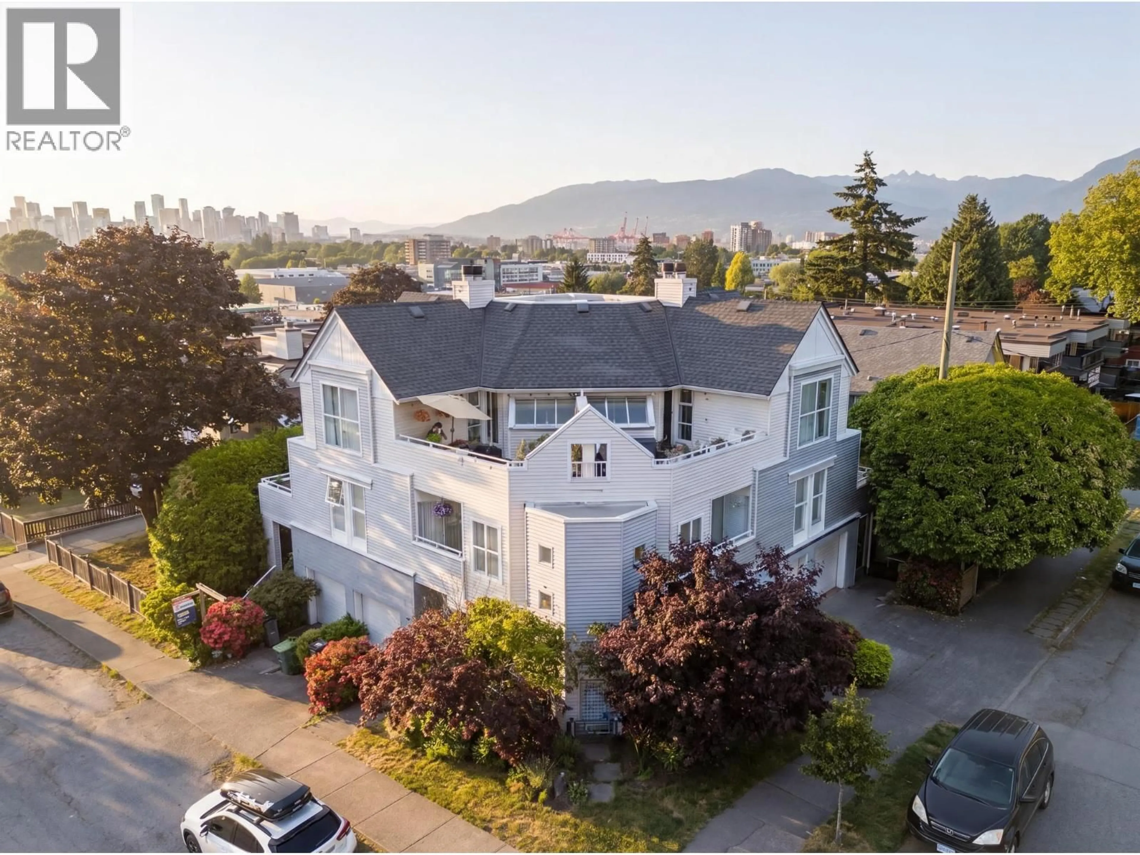 A pic from outside/outdoor area/front of a property/back of a property/a pic from drone, mountain view for 1345 WOODLAND DRIVE, Vancouver British Columbia V5L3S4
