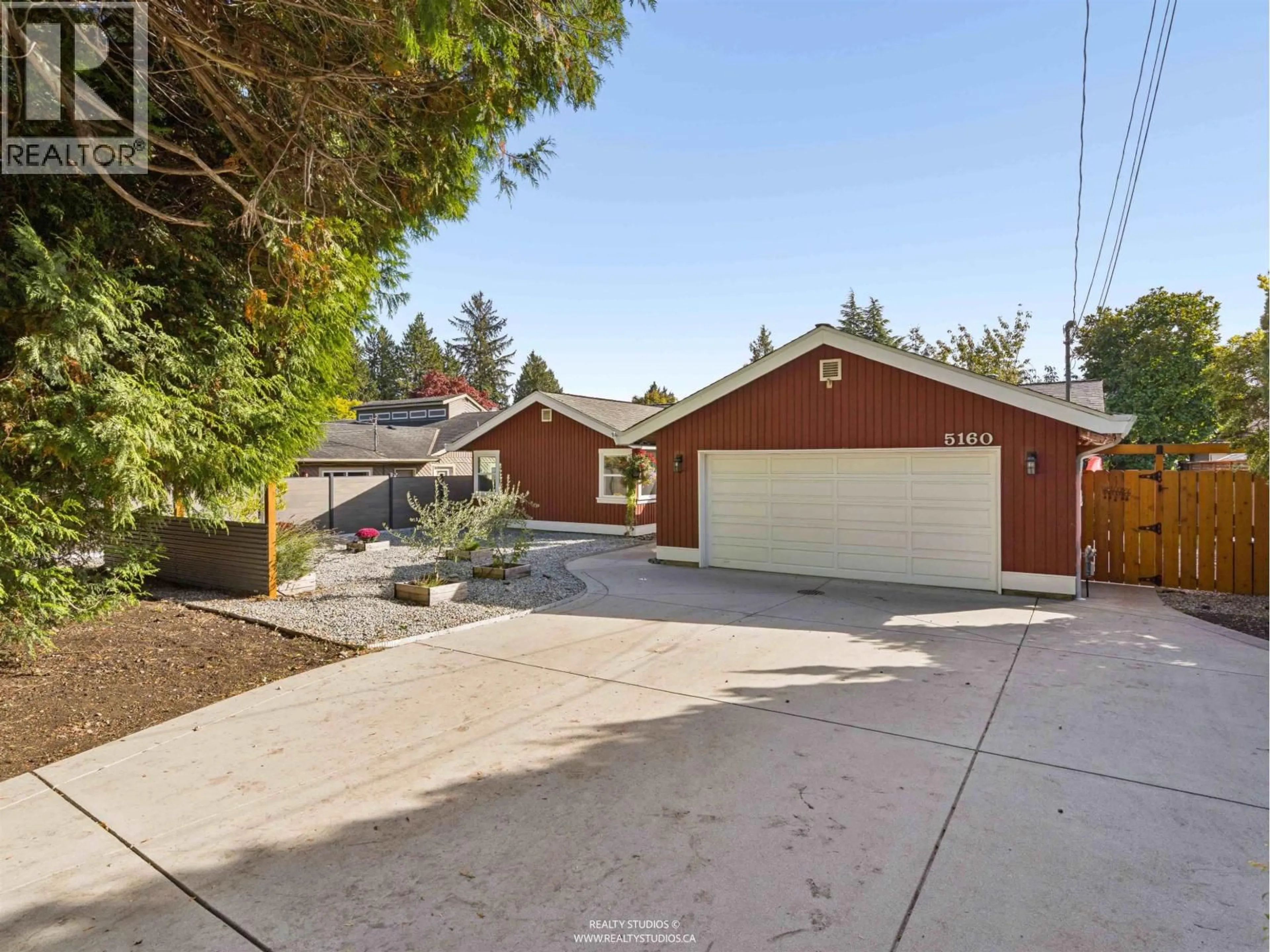 A pic from outside/outdoor area/front of a property/back of a property/a pic from drone, street for 5160 12 AVENUE, Delta British Columbia V4M2A8