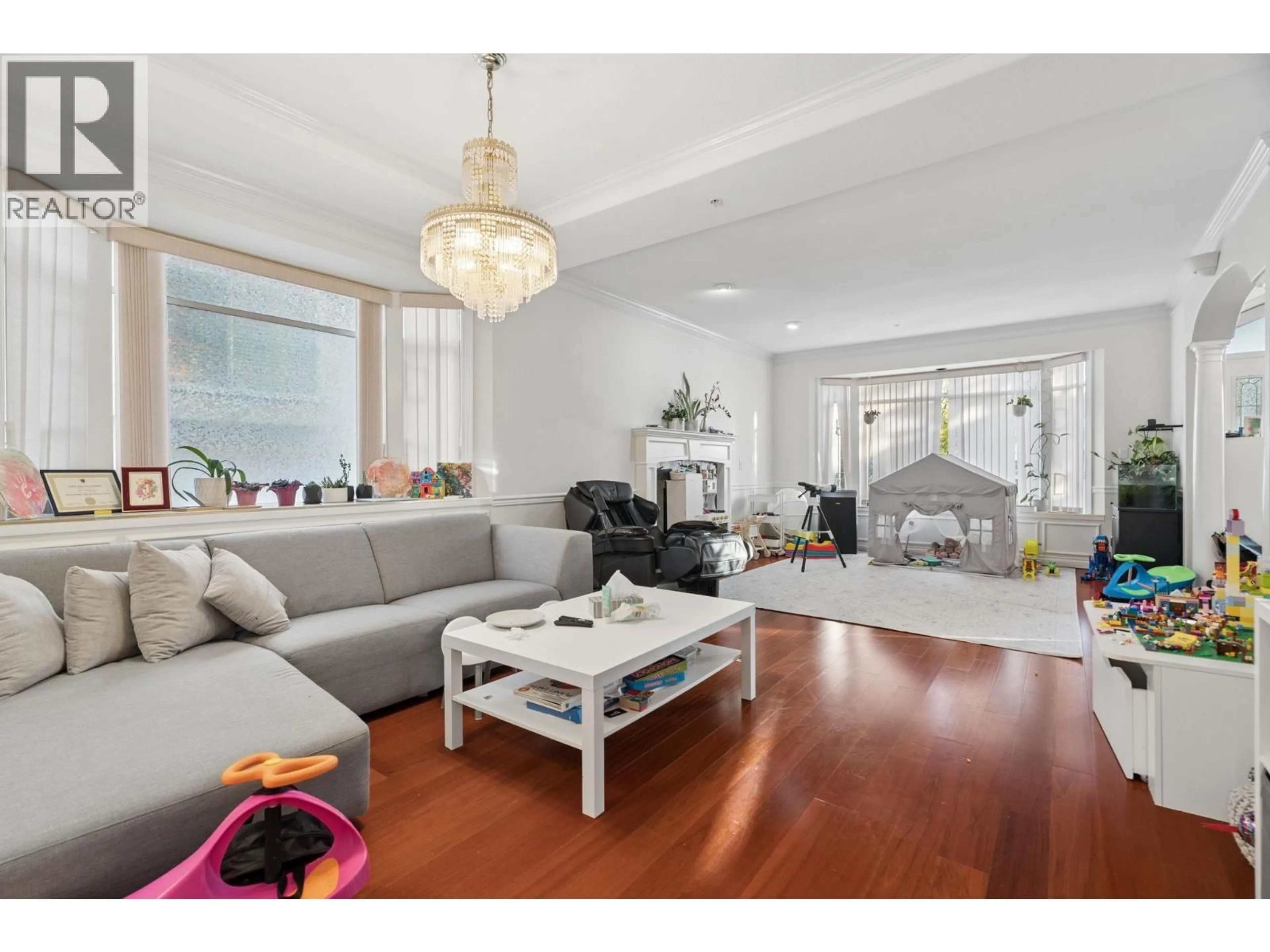 Living room with furniture, wood/laminate floor for 1767 61ST AVENUE, Vancouver British Columbia V6P2C2