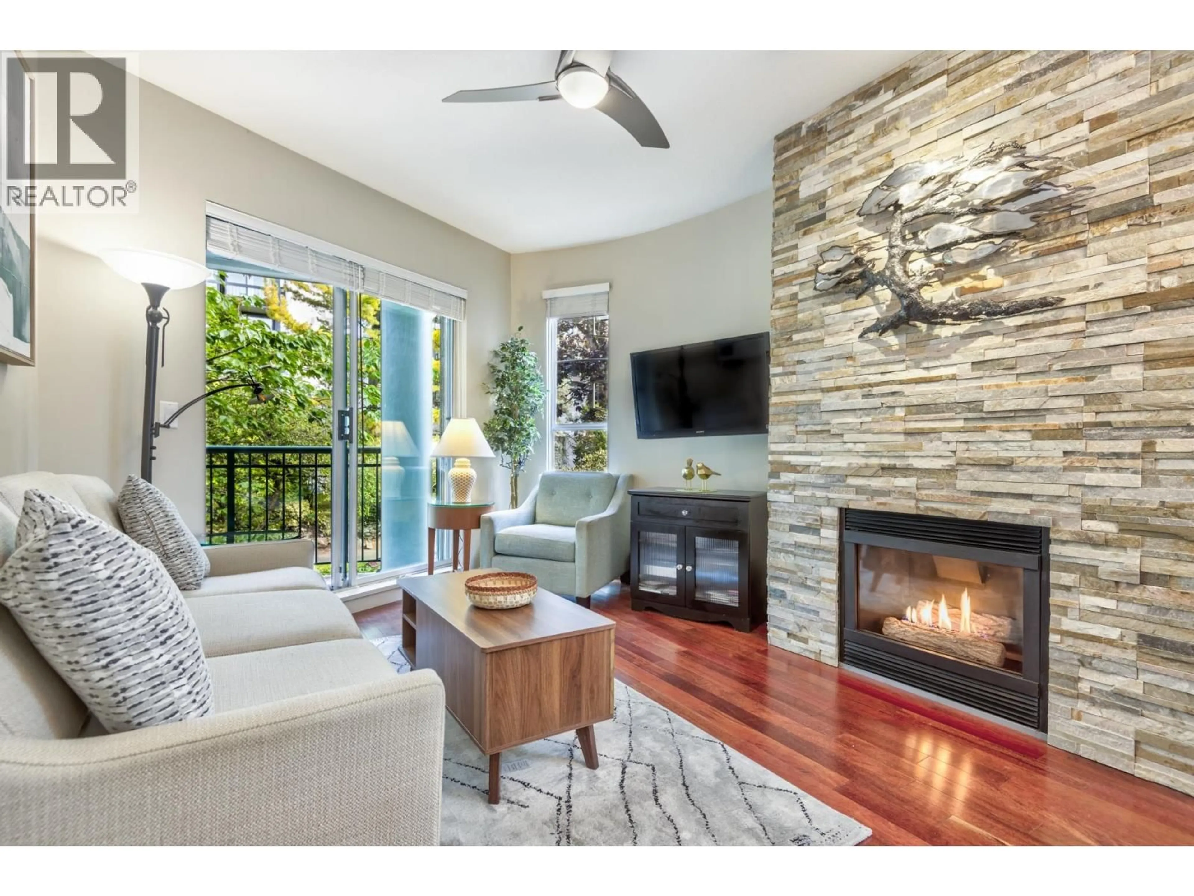 Living room with furniture, wood/laminate floor for 202 - 1928 NELSON STREET, Vancouver British Columbia V6G1N2