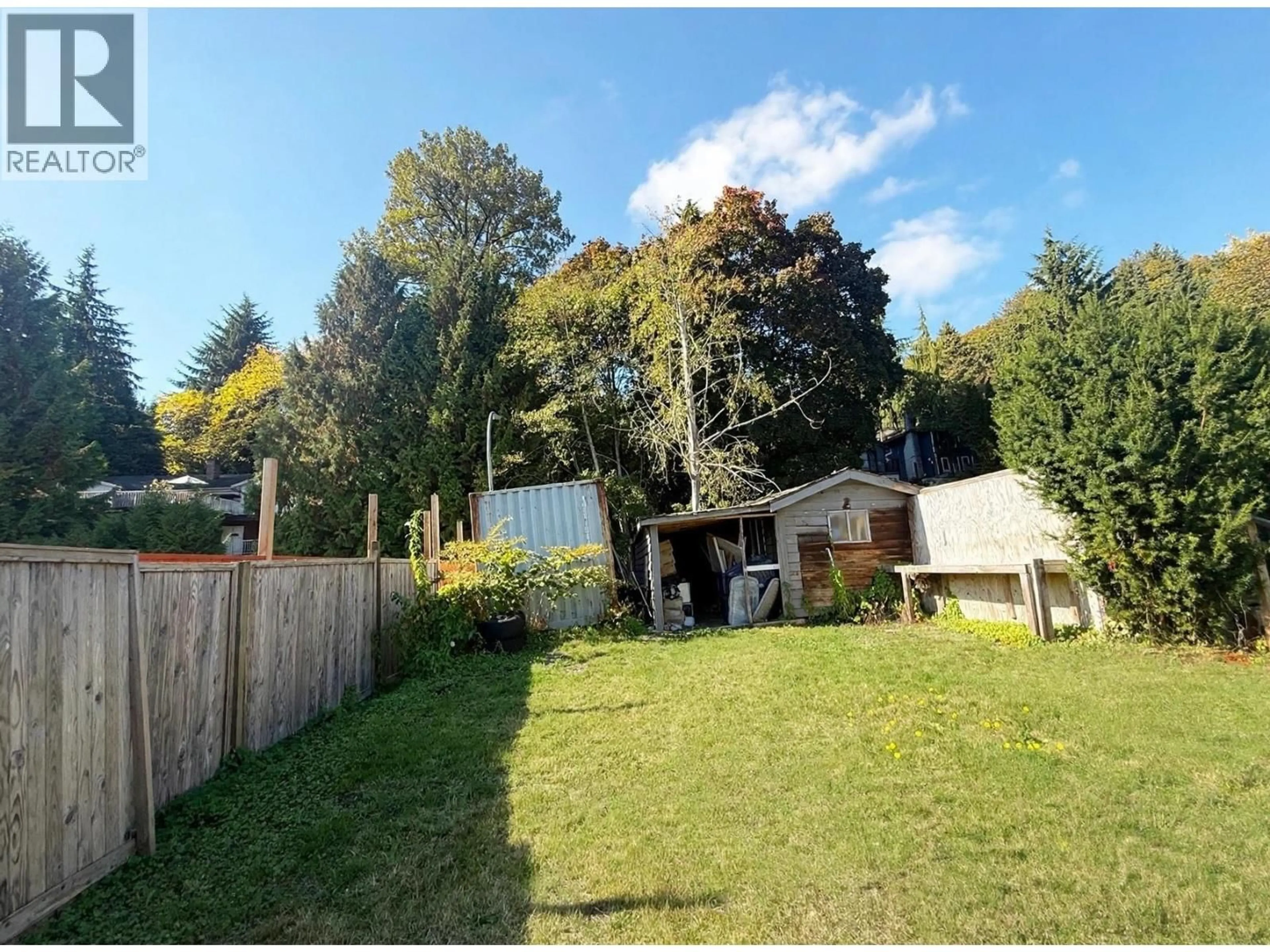 A pic from outside/outdoor area/front of a property/back of a property/a pic from drone, forest/trees view for 1815 BARNET HIGHWAY, Port Moody British Columbia V3H1V9