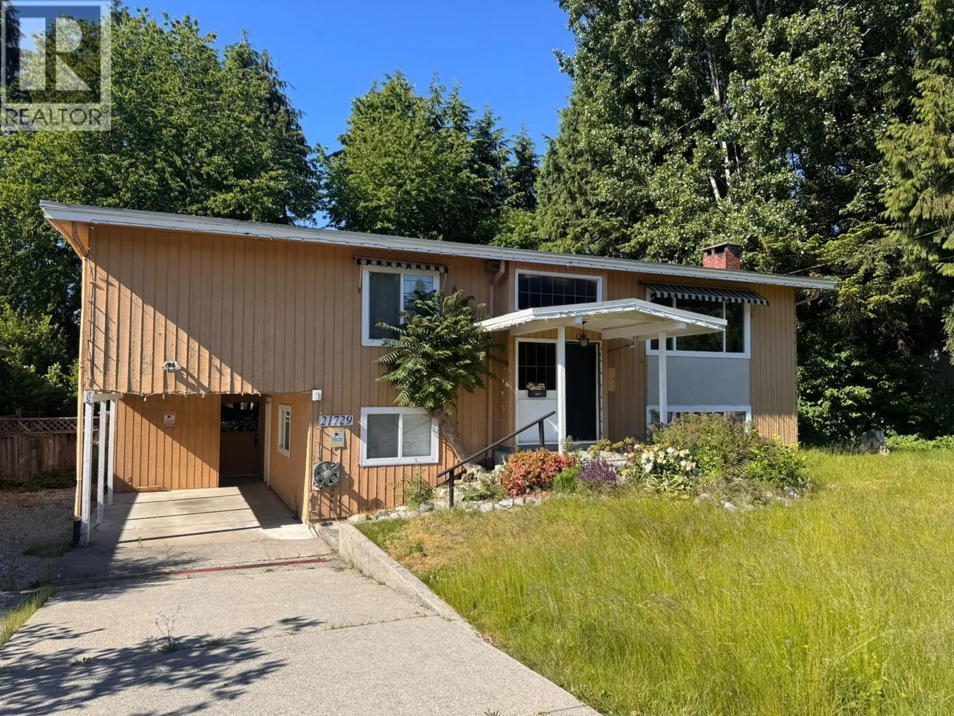 Home with vinyl exterior material, street for 21729 124 AVENUE, Maple Ridge British Columbia V2X4H6
