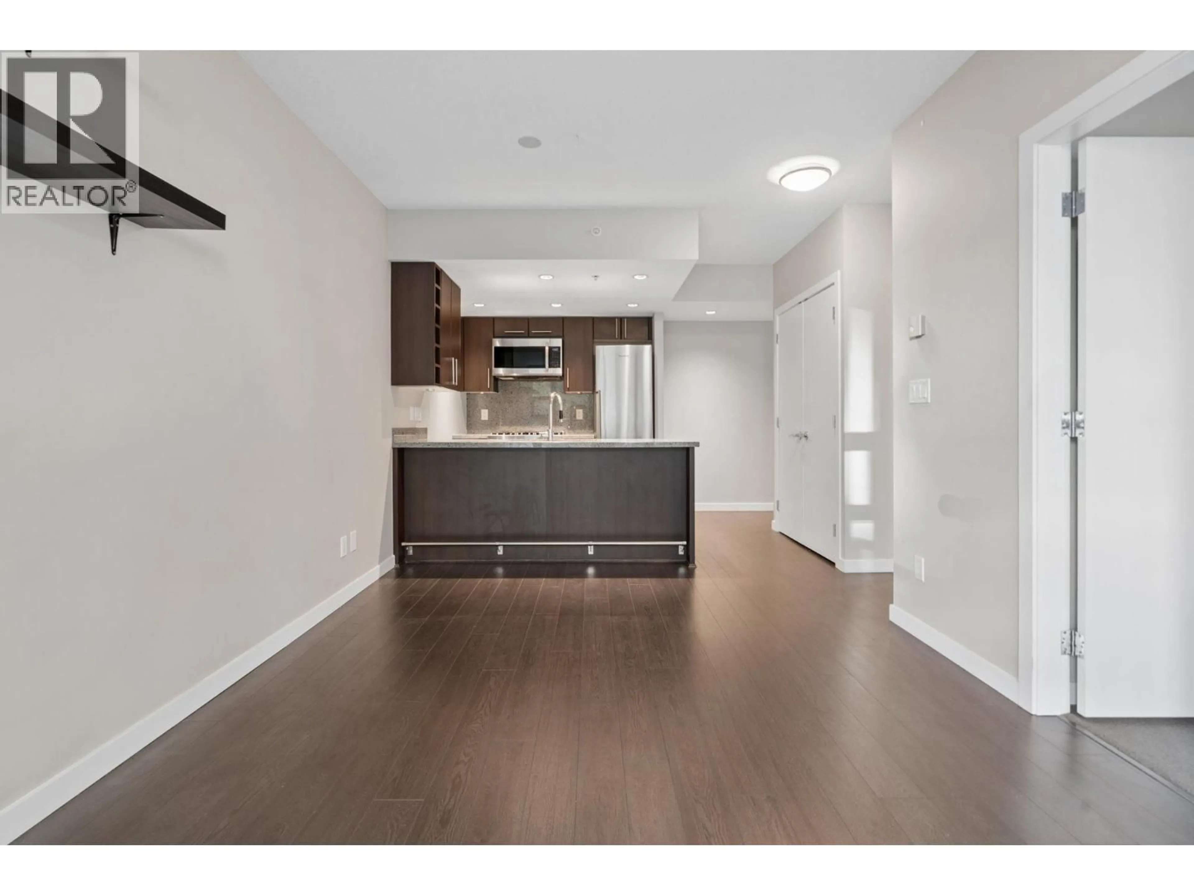 Open concept kitchen, wood/laminate floor for 711 - 1708 COLUMBIA STREET, Vancouver British Columbia V5Y0H7