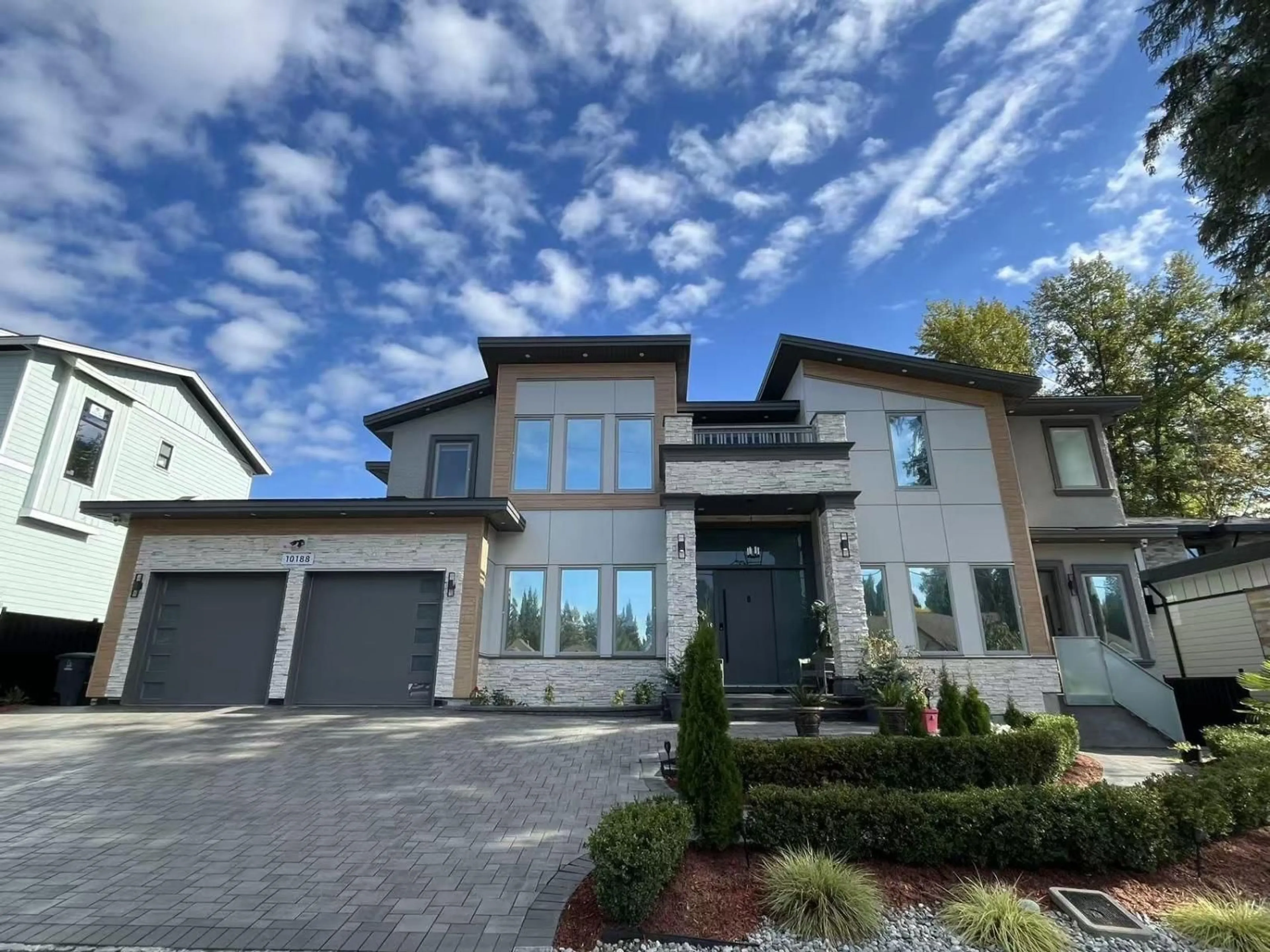 Home with brick exterior material, street for 10188 161ST STREET, Surrey British Columbia V4N2J7