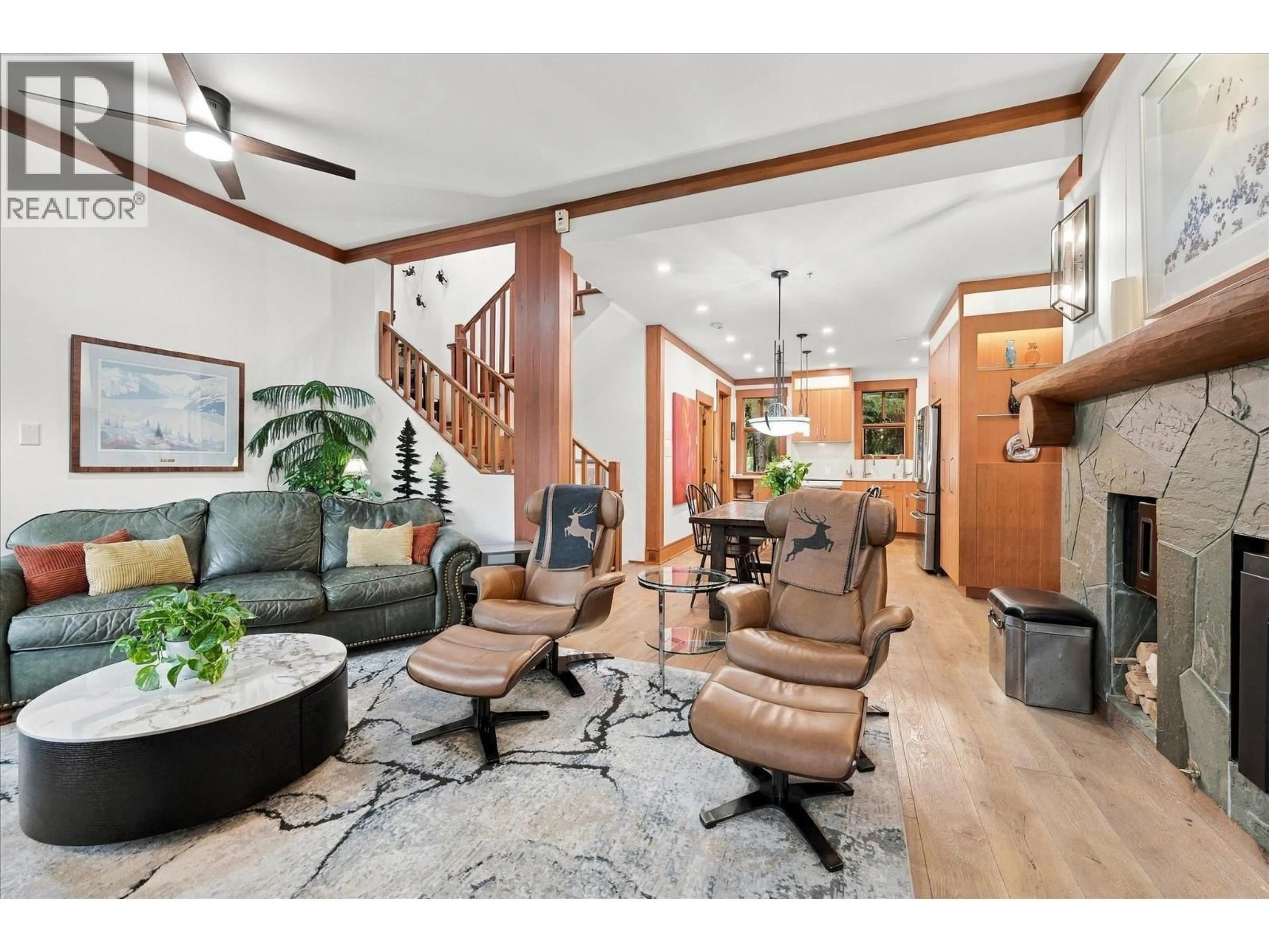 Living room with furniture, wood/laminate floor for 23 - 2324 TALUSWOOD PLACE, Whistler British Columbia V8E0R1