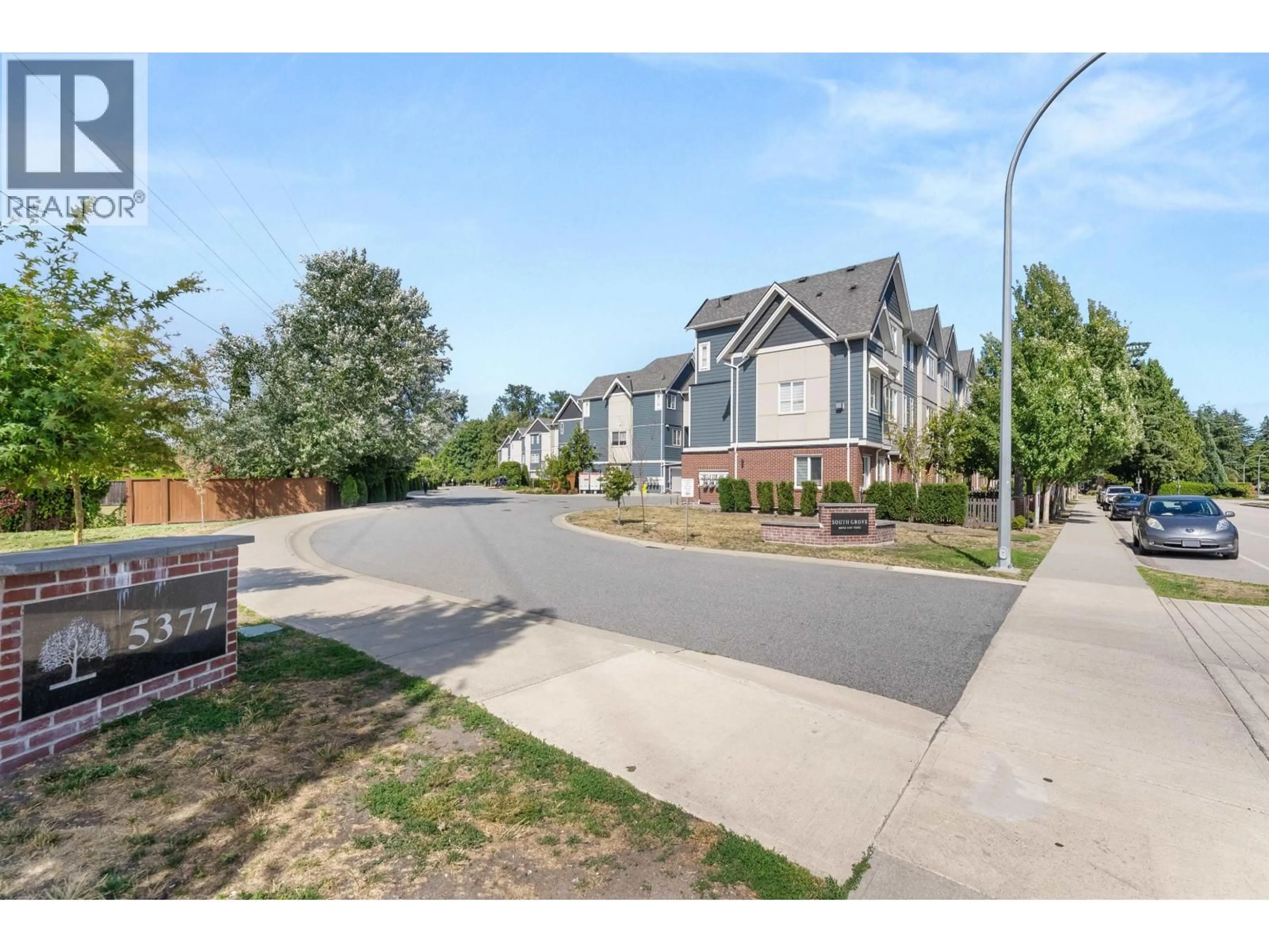 A pic from outside/outdoor area/front of a property/back of a property/a pic from drone, street for 34 - 5377 8A AVENUE, Tsawwassen British Columbia V4M0E2