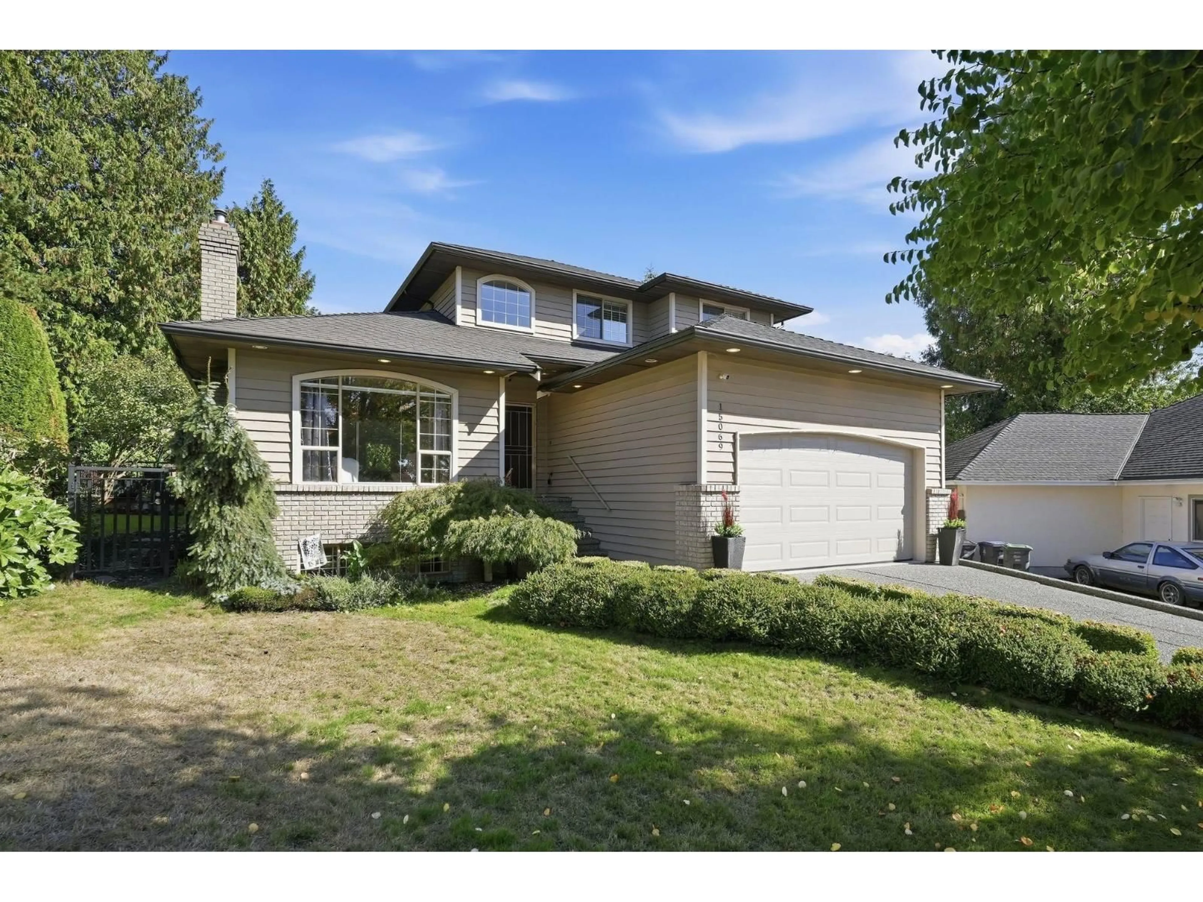 Home with vinyl exterior material, street for 15069 82 AVENUE, Surrey British Columbia V3S7V6