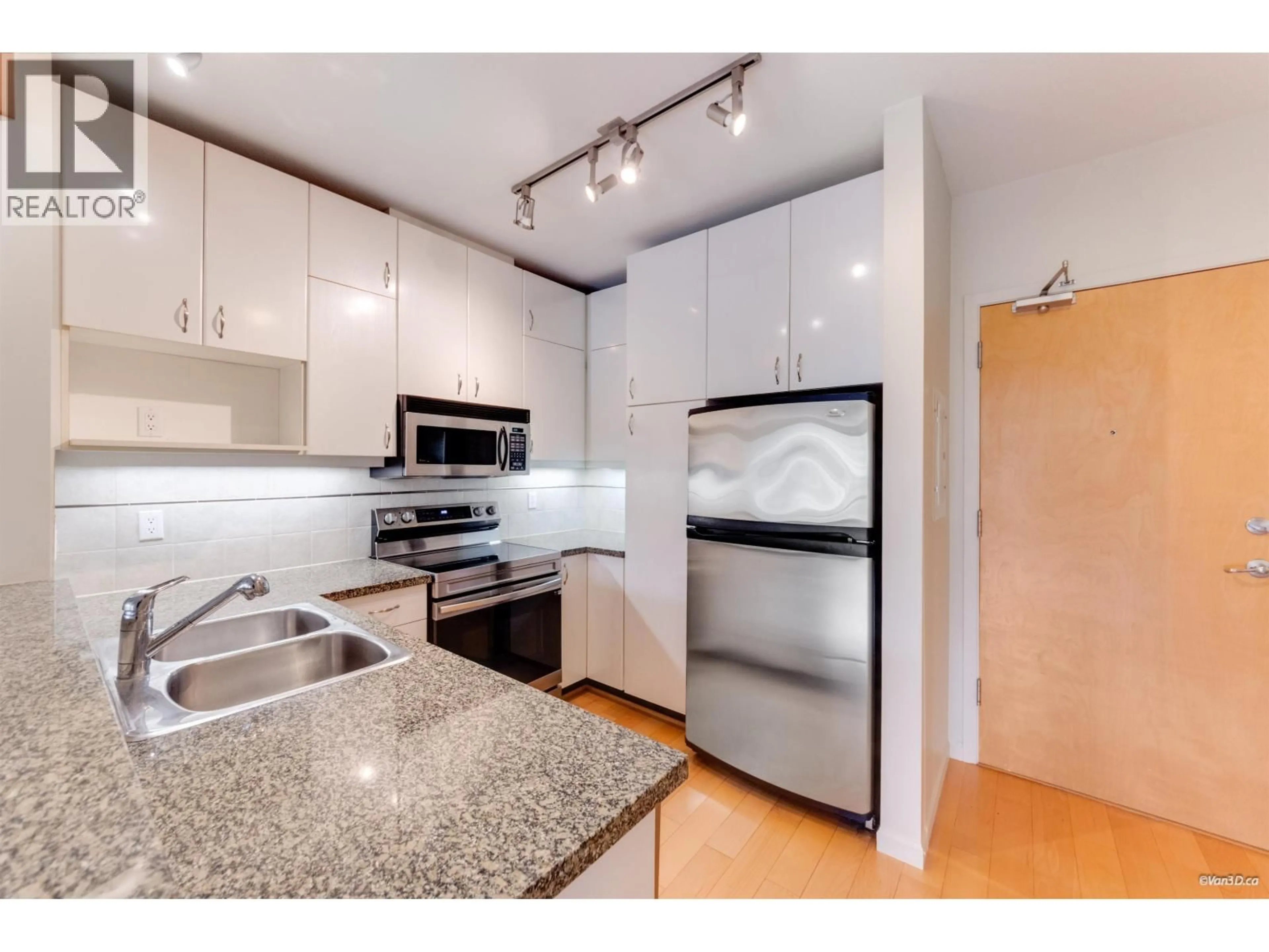 Standard kitchen, wood/laminate floor for 319 - 580 RAVEN WOODS DRIVE, North Vancouver British Columbia V7G2T2