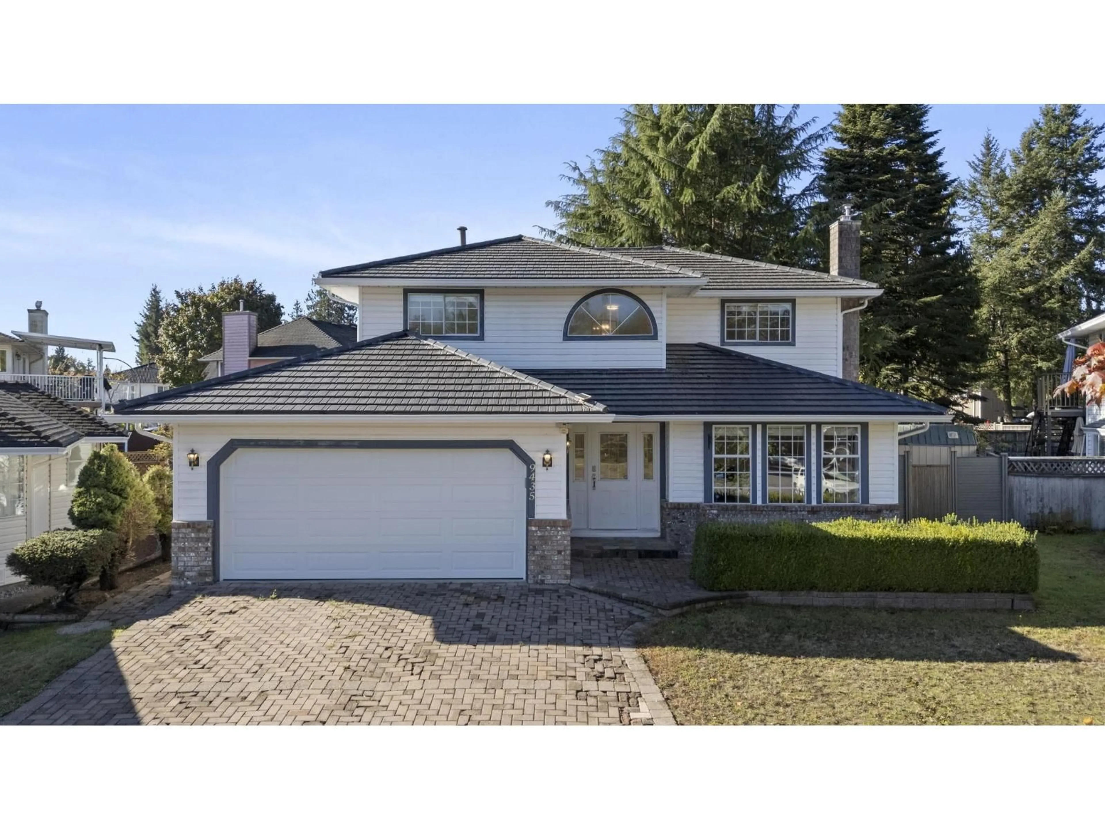 Home with vinyl exterior material, street for 9435 156A STREET, Surrey British Columbia V4N3B5