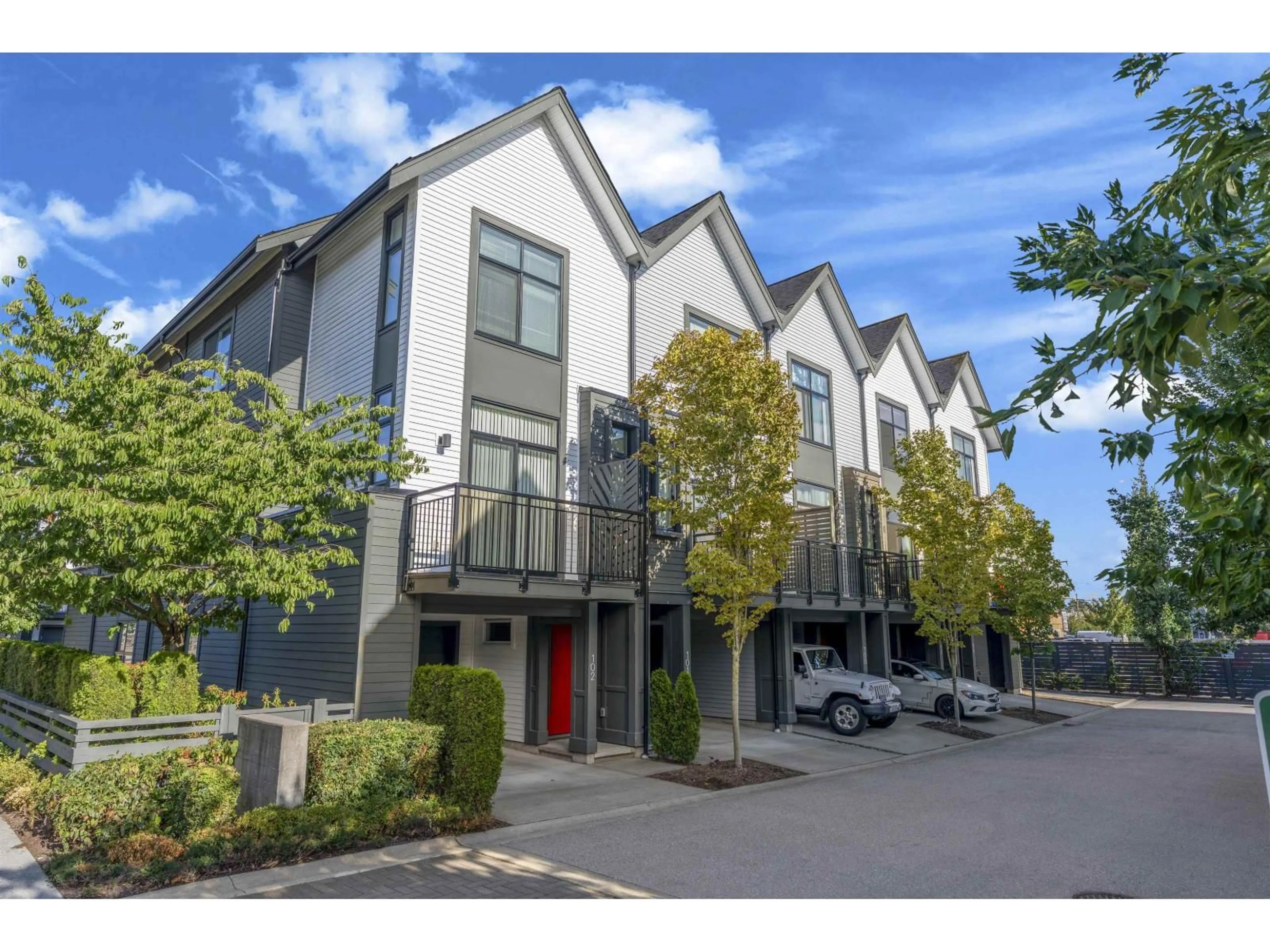 A pic from outside/outdoor area/front of a property/back of a property/a pic from drone, street for 99 - 17568 57A AVENUE, Surrey British Columbia V3S7V2
