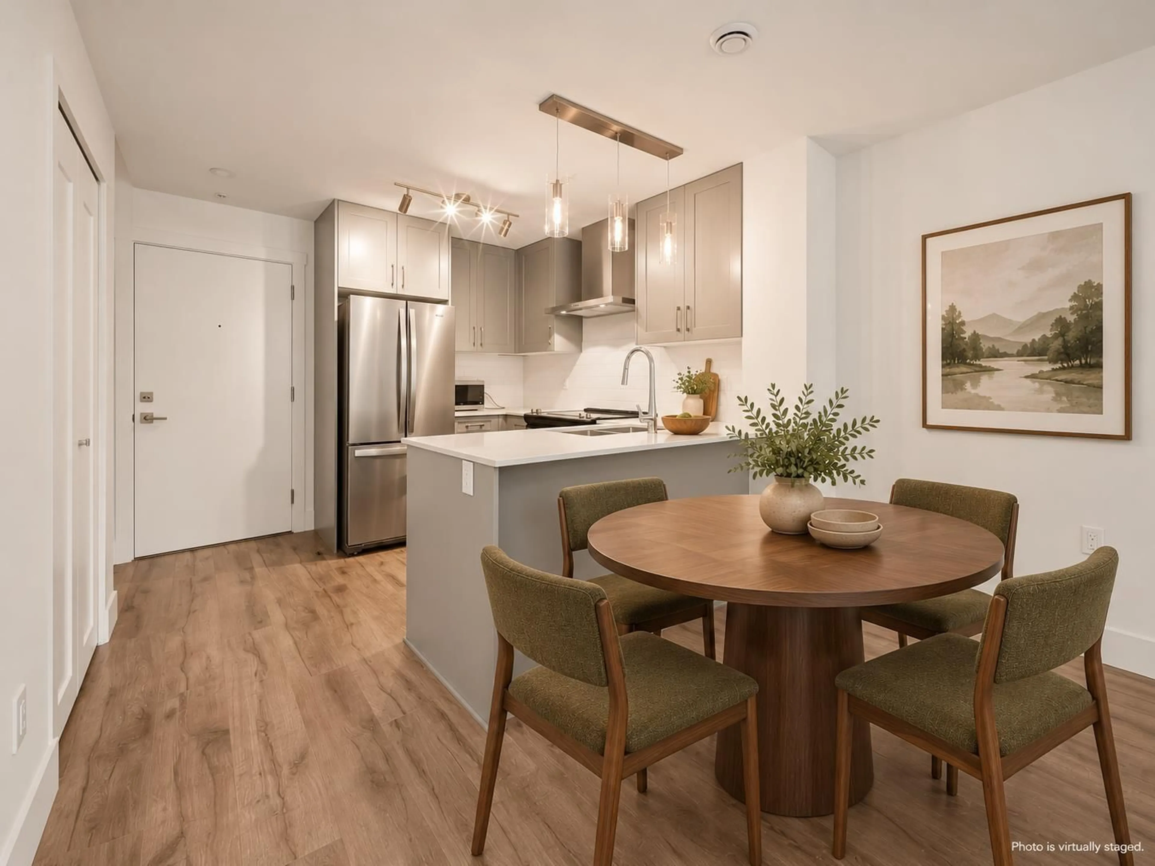 Open concept kitchen, wood/laminate floor for 306 - 6338 KING GEORGE BOULEVARD, Surrey British Columbia V3X1E9