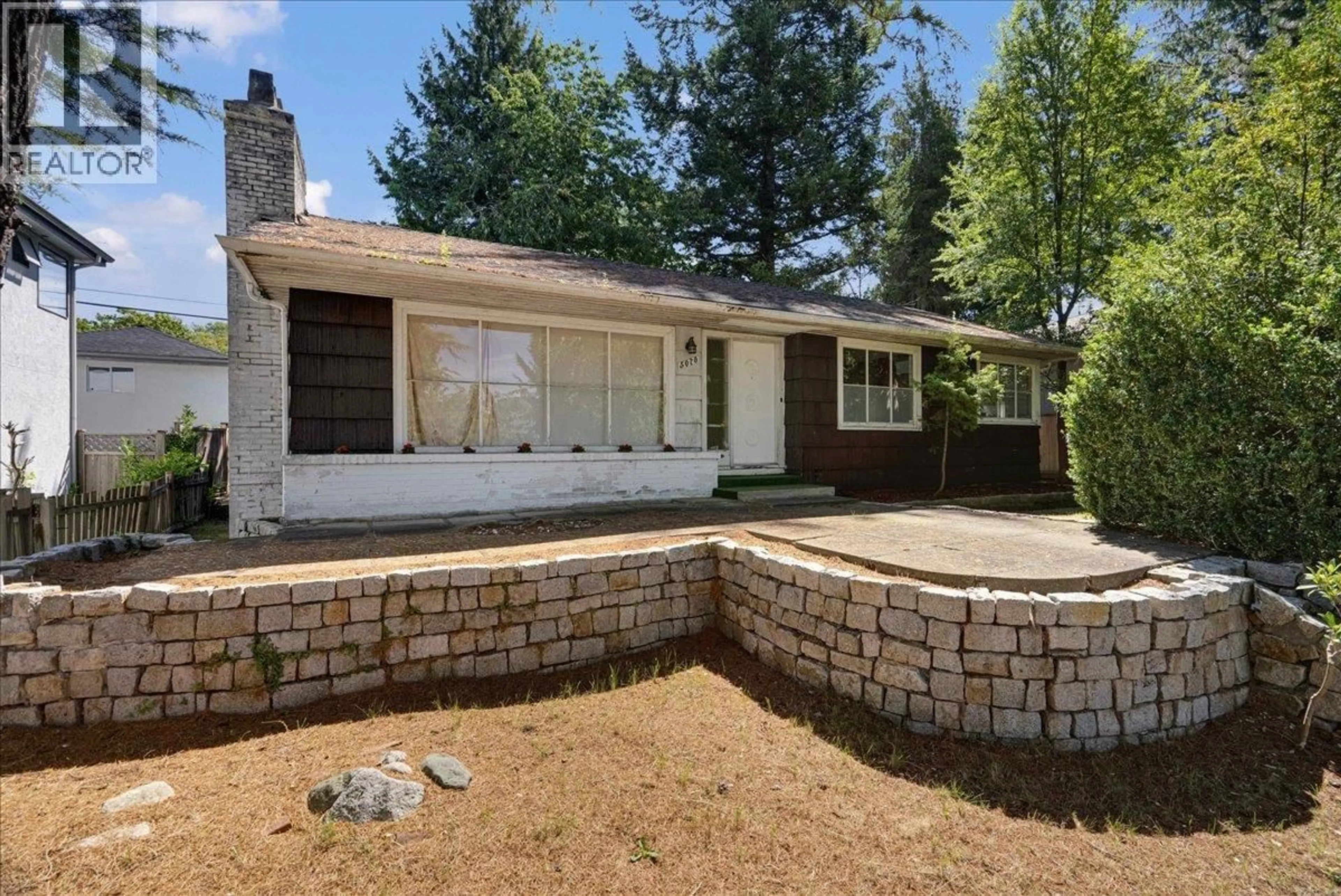 Home with brick exterior material, street for 5070 WILLOW STREET, Vancouver British Columbia V5Z3R9