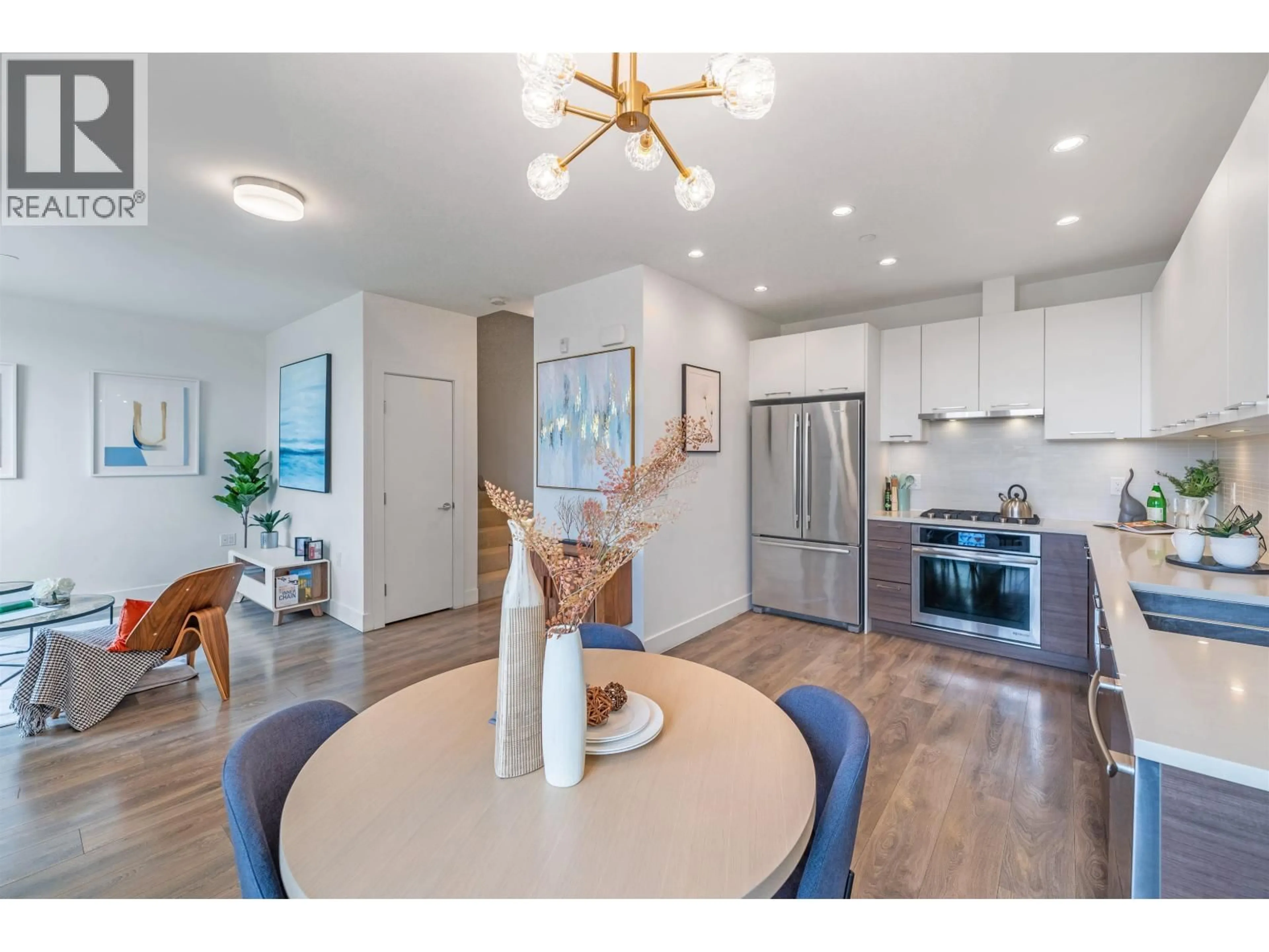 Open concept kitchen, wood/laminate floor for 1 - 8599 RIVER DISTRICT CROSSING, Vancouver British Columbia V5S0C7