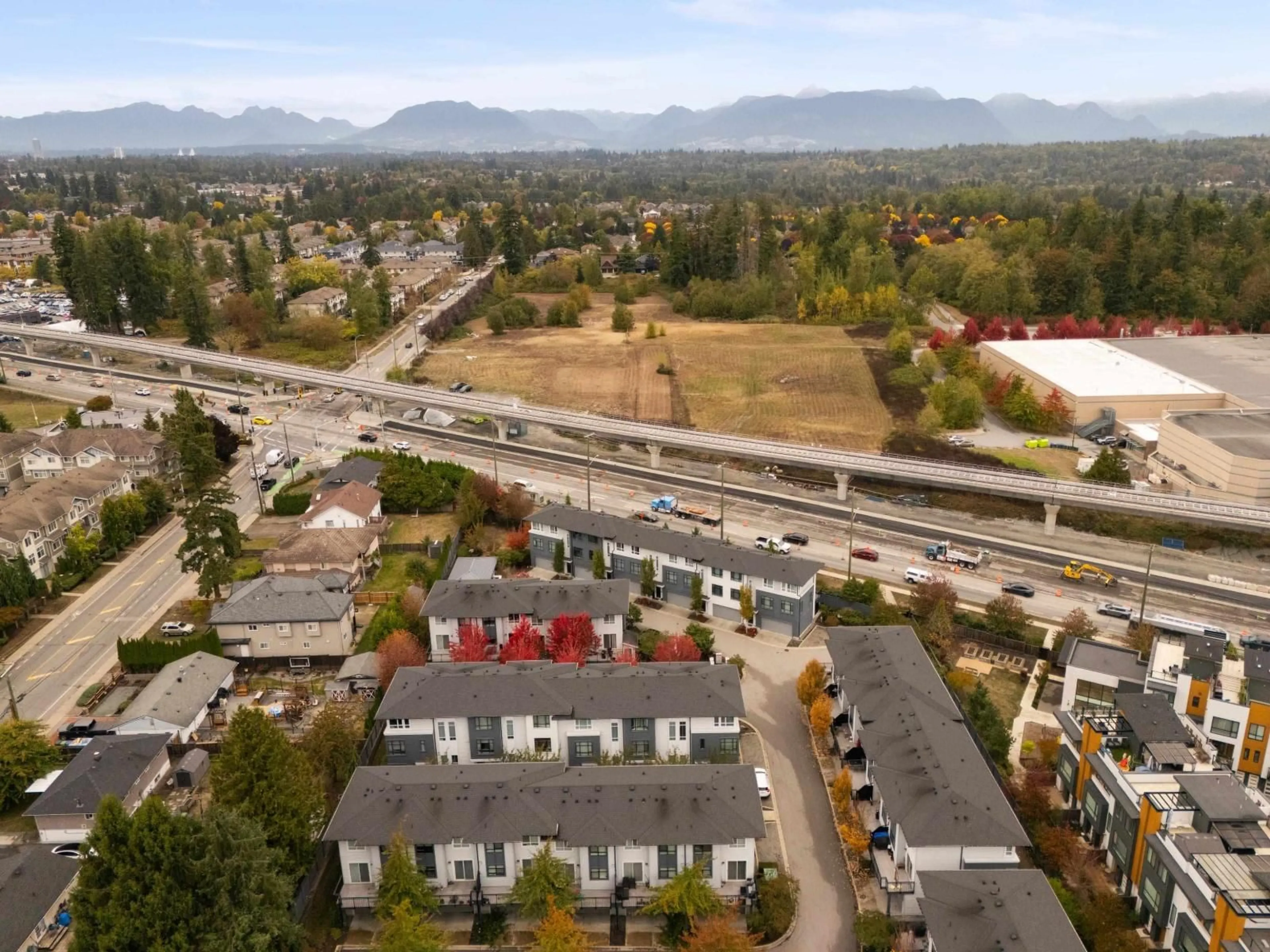 A pic from outside/outdoor area/front of a property/back of a property/a pic from drone, mountain view for 1305 - 16433 WATSON DRIVE, Surrey British Columbia V4N6R9